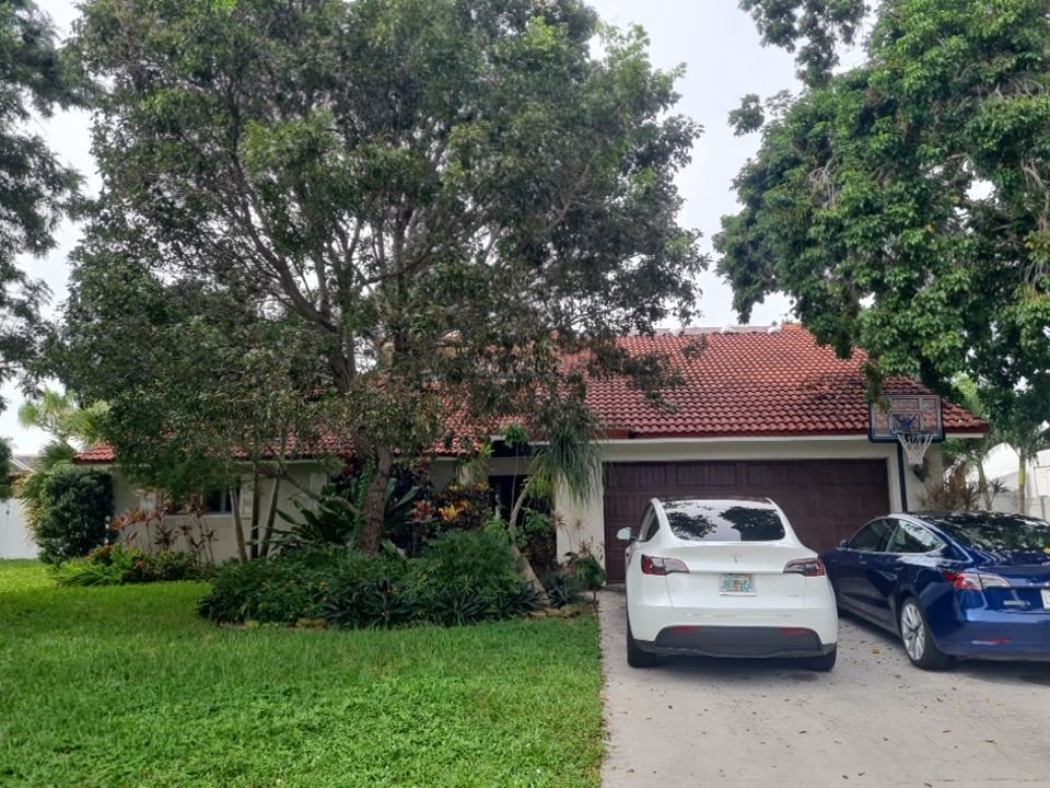 Residential Roofing Installation using 1" Nail strip metal roof by BLUES BROTHERS CONSTRUCTION CORP