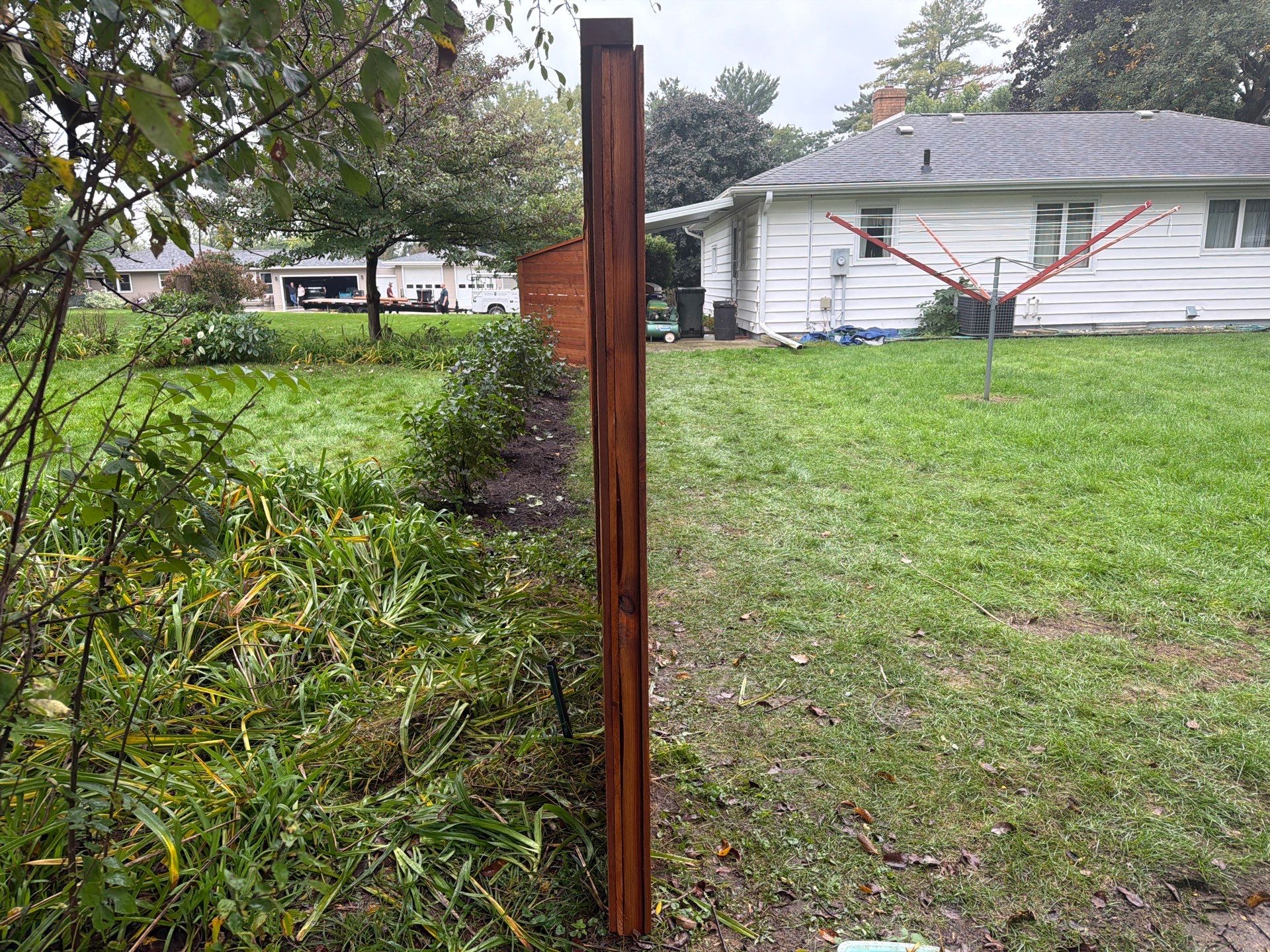 Stained Horizontal Cedar Wood Privacy Fence in Cedar Falls by Perfect Picket Fence and Stain