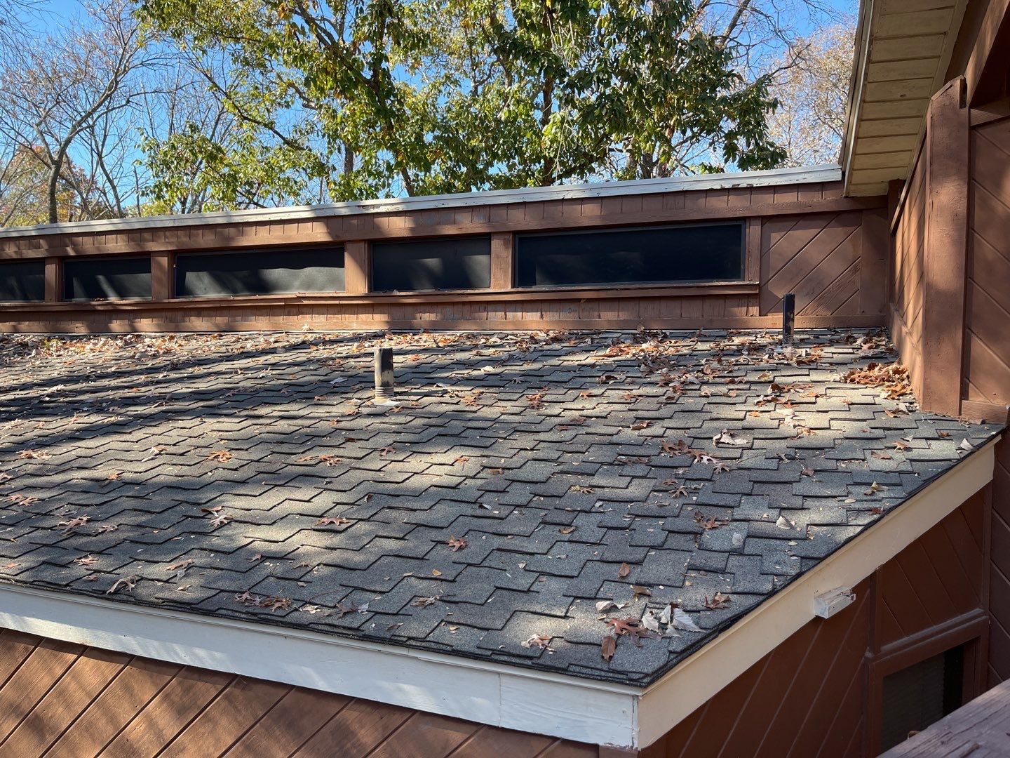 Residential Roofing Installation using Standing Seam Metal Roofing and Composition Shingles by Rainy Day Restoration