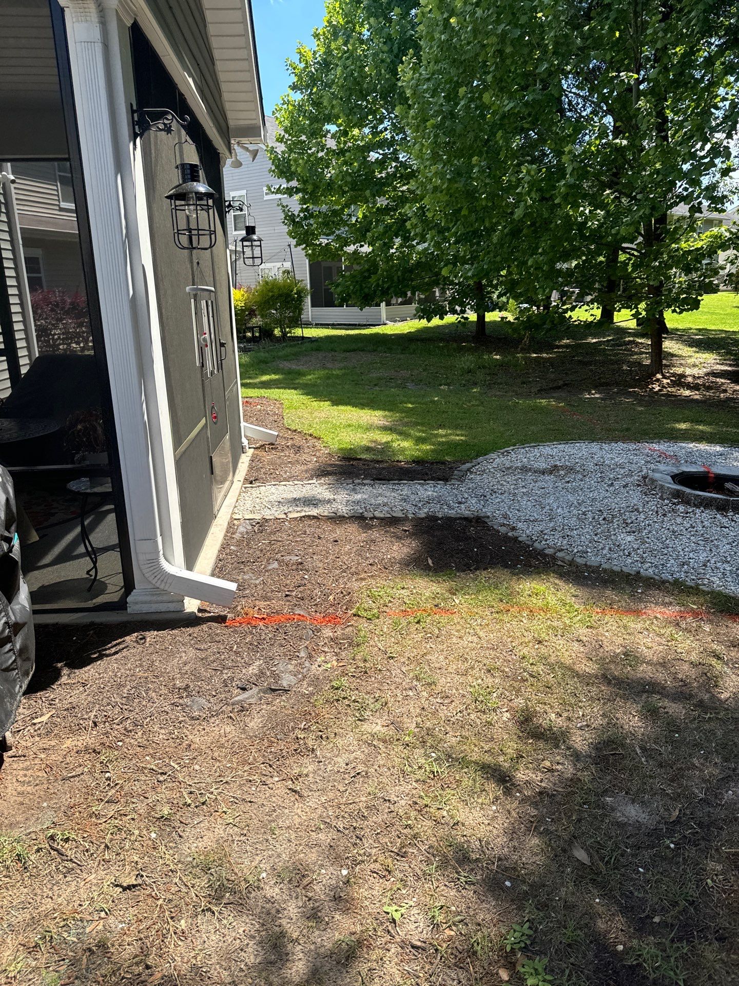 Custom Paver Patio Extension and Circular Fire Pit in Bluffton by Lowcountry Scapes, LLC