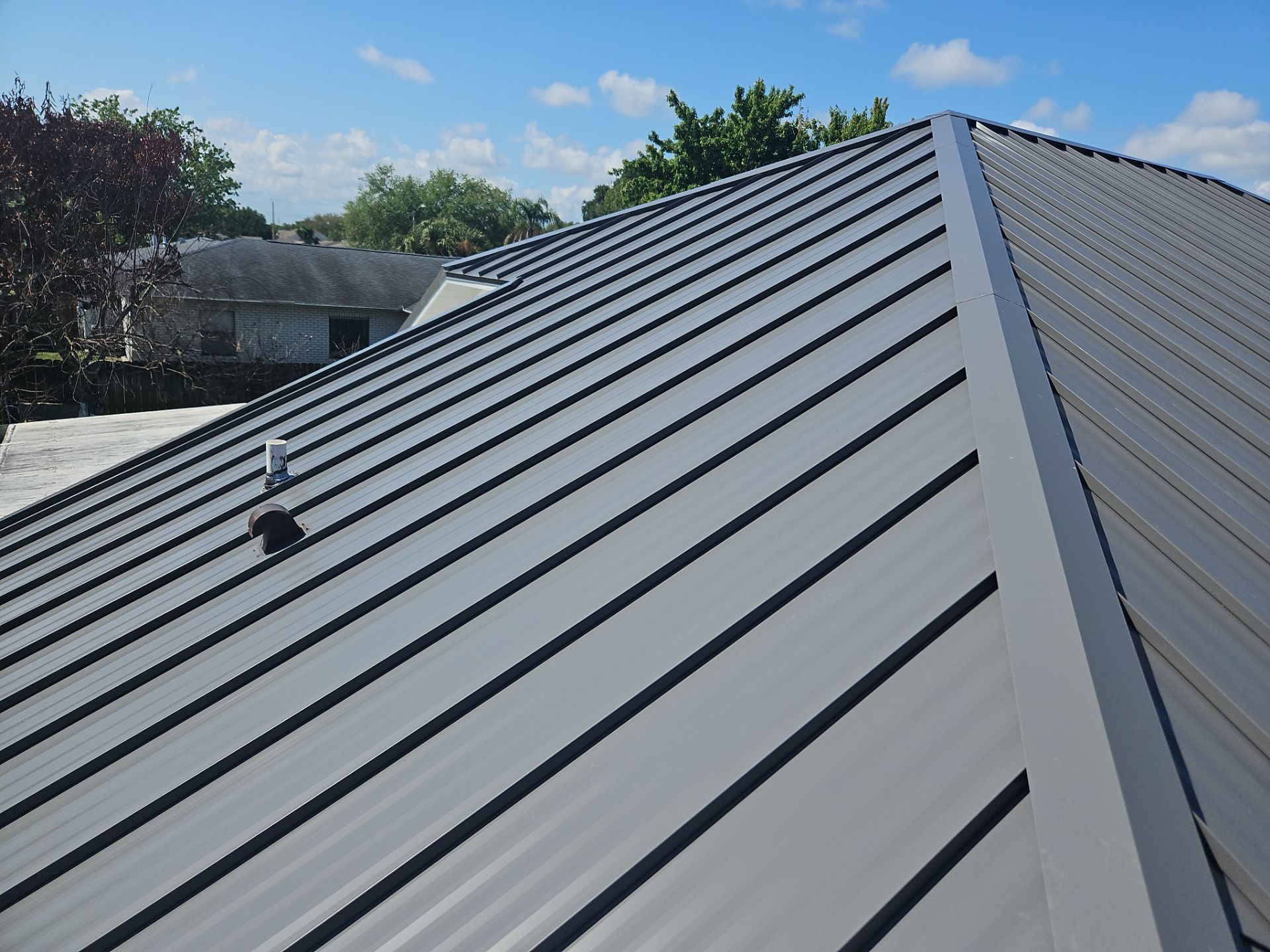 Complete Metal Roof Replacement and Seamless Gutter Installation in Melbourne