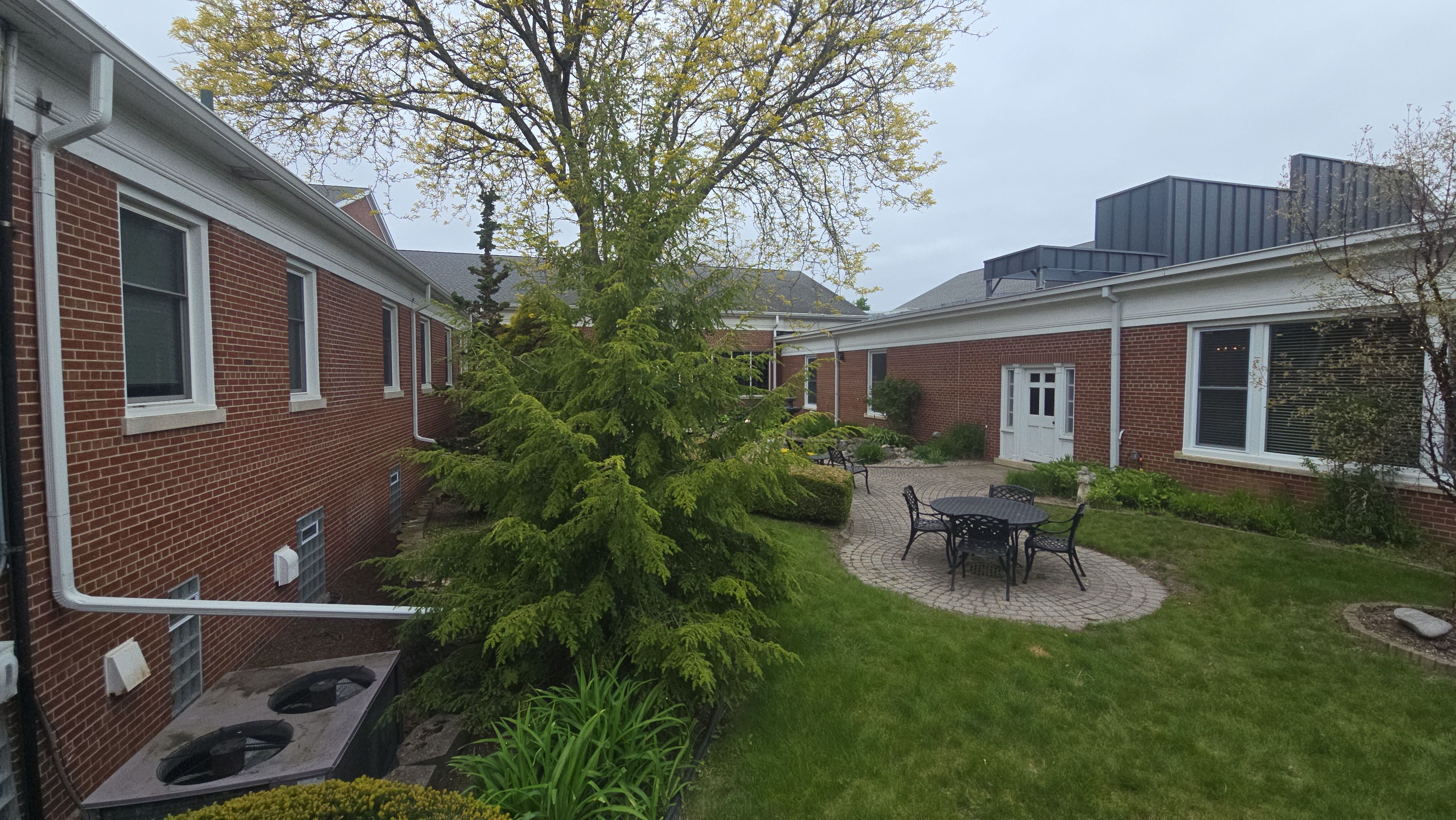 Commercial Wood Trim Restoration and Gutter Replacement in Birmingham by Top Shelf Painter