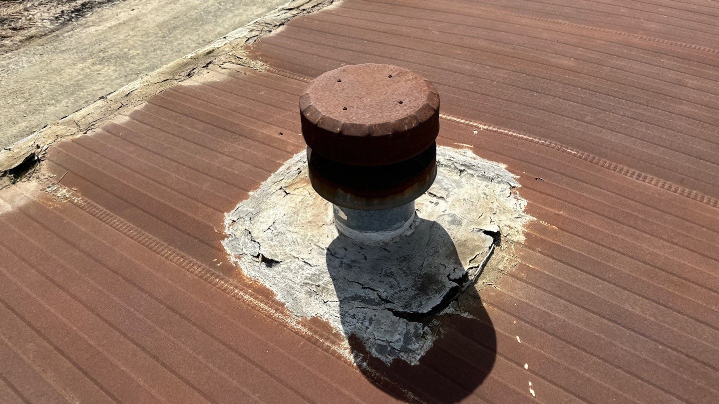 Foam and coatings on mobile home by Straight Edge Roofing Inc