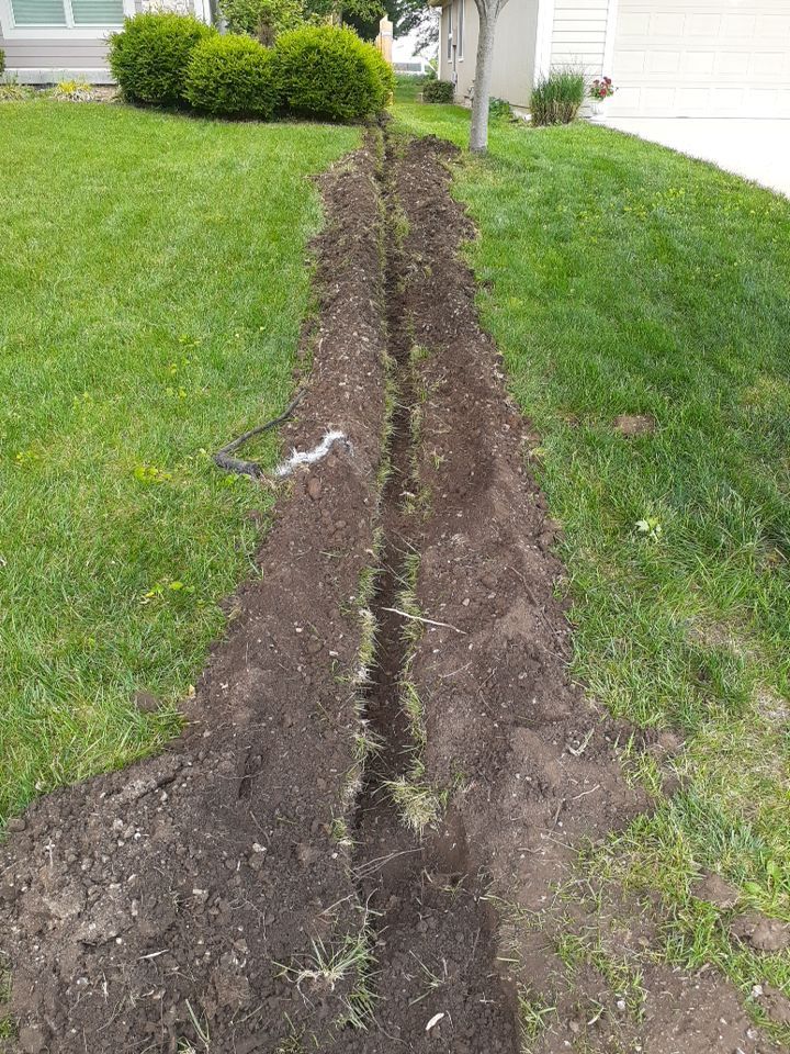 Drainage and Downspout Installation by LAND ESCAPES LLC