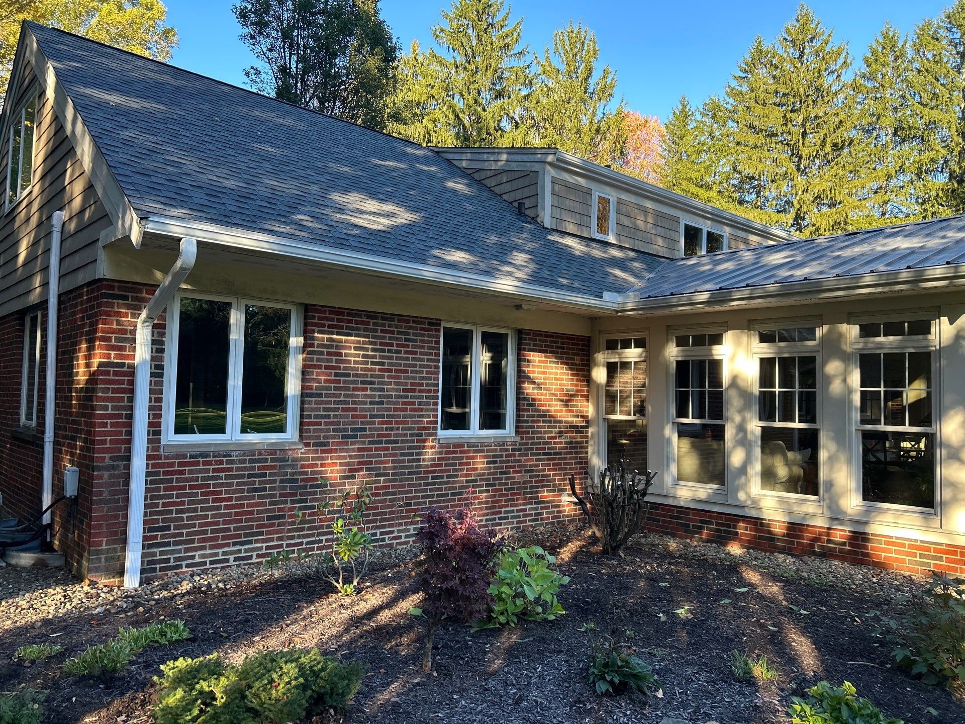 Moreland Hills Roof + Gutters Replacement by Atlas Roofing & Restoration