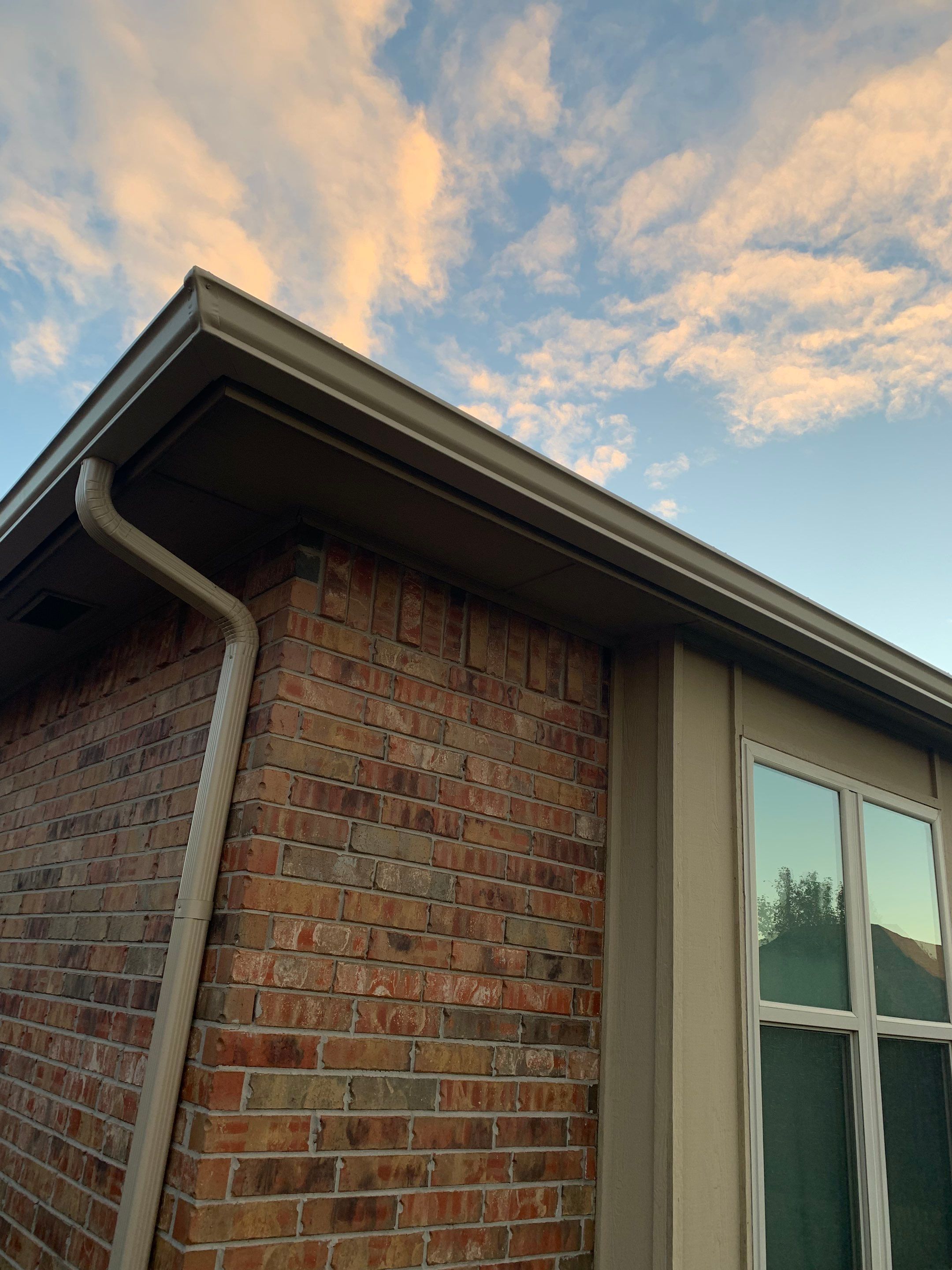 roof replacement & gutter installation in Edmond by McCann's Roofing and Construction