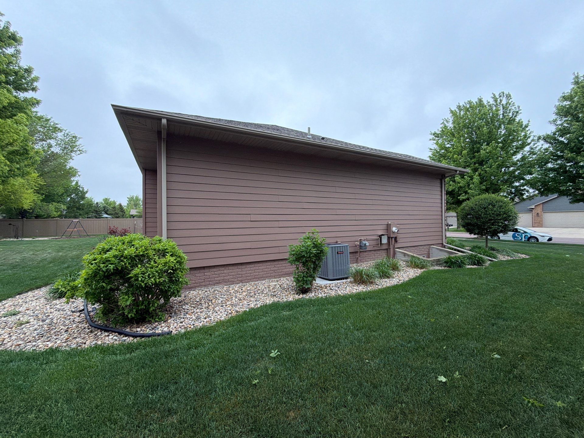 Exterior Painting and Wooden Deck Staining in Sioux Falls by Select Painting, Coatings & Garage Cabinets