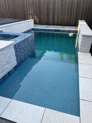 Geometric Pool and Spa with Glass Tile Walls