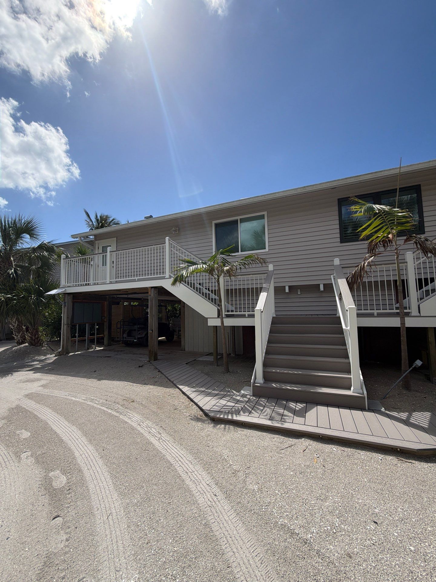 Elevated Deck and Composite Staircase Replacement in Placida Florida by Smirnov Construction Inc