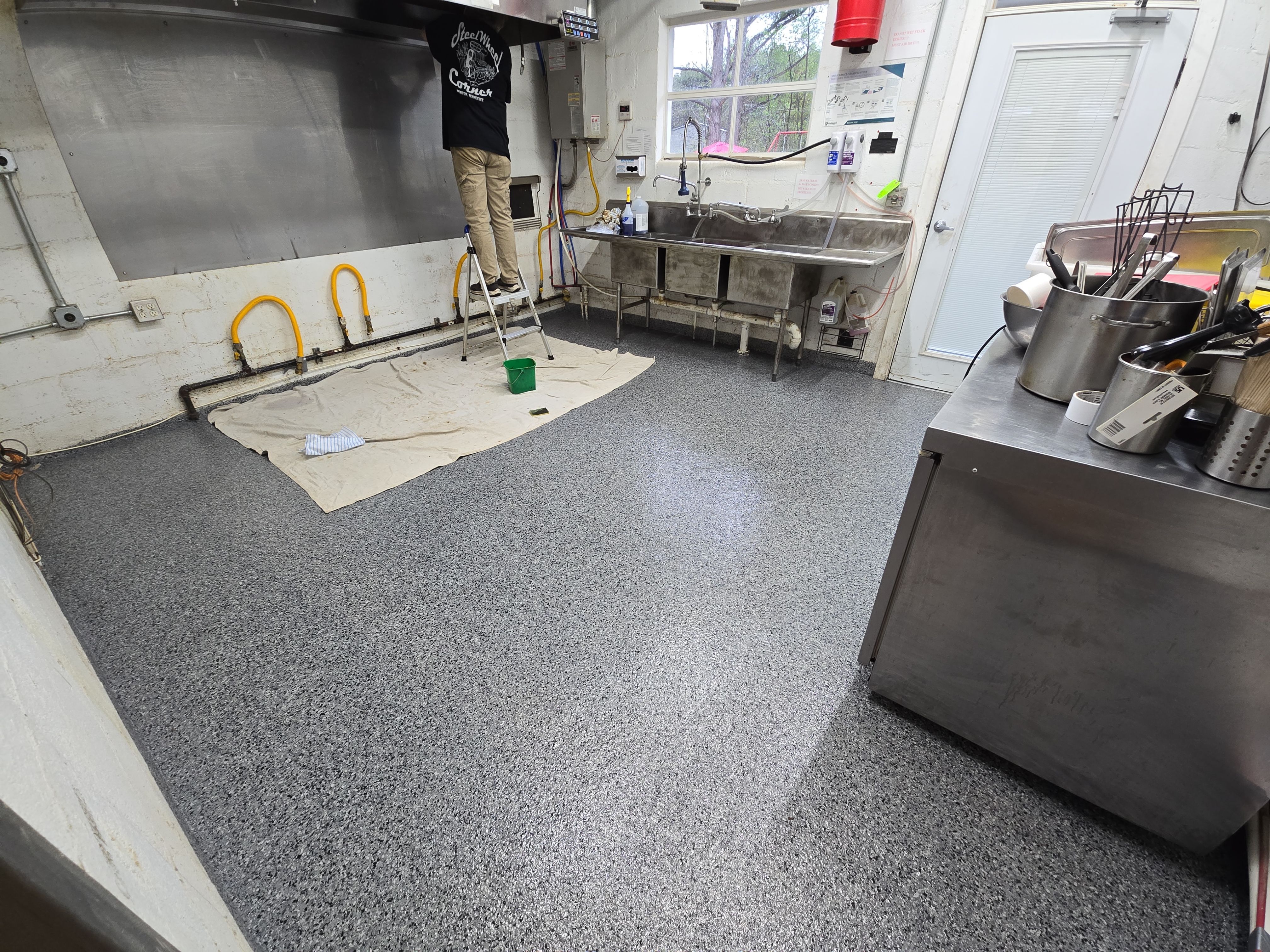 Check it out! Steelwheel Corner gets a new floor! by Elite Floor Solutions