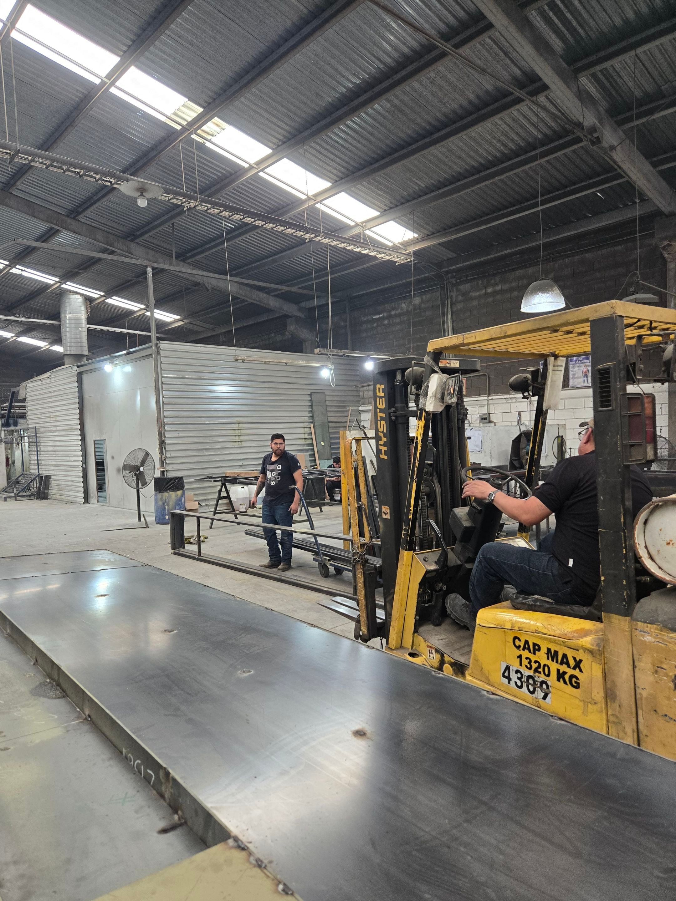 Custom Pivot Door and Structural Steel Frame Installation in Fort Worth by Solara Custom Living