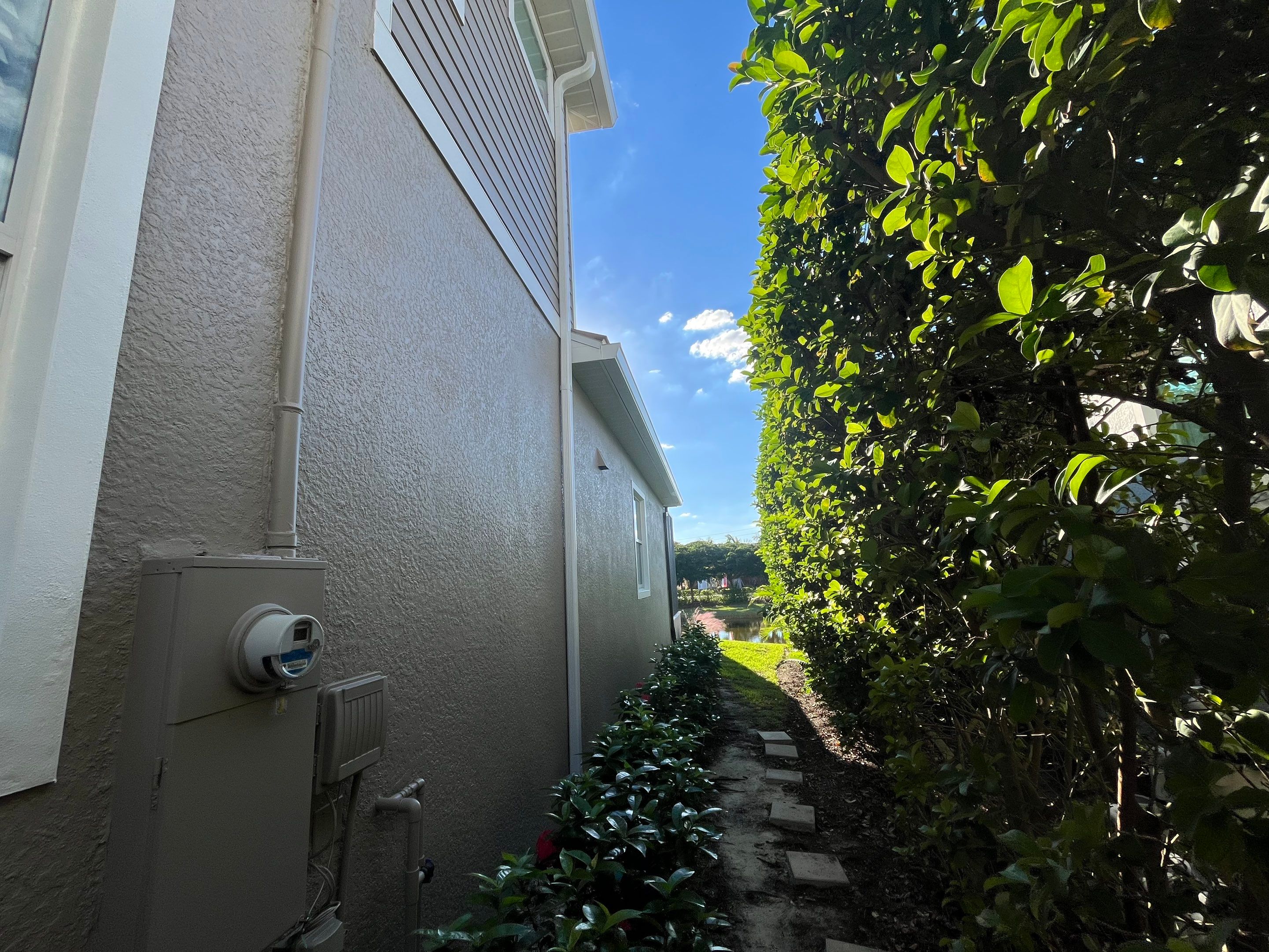 Bronze Downspouts & 7-Inch K-style Seamless Gutter Installation in Fort Myers FL by Gutter Professors