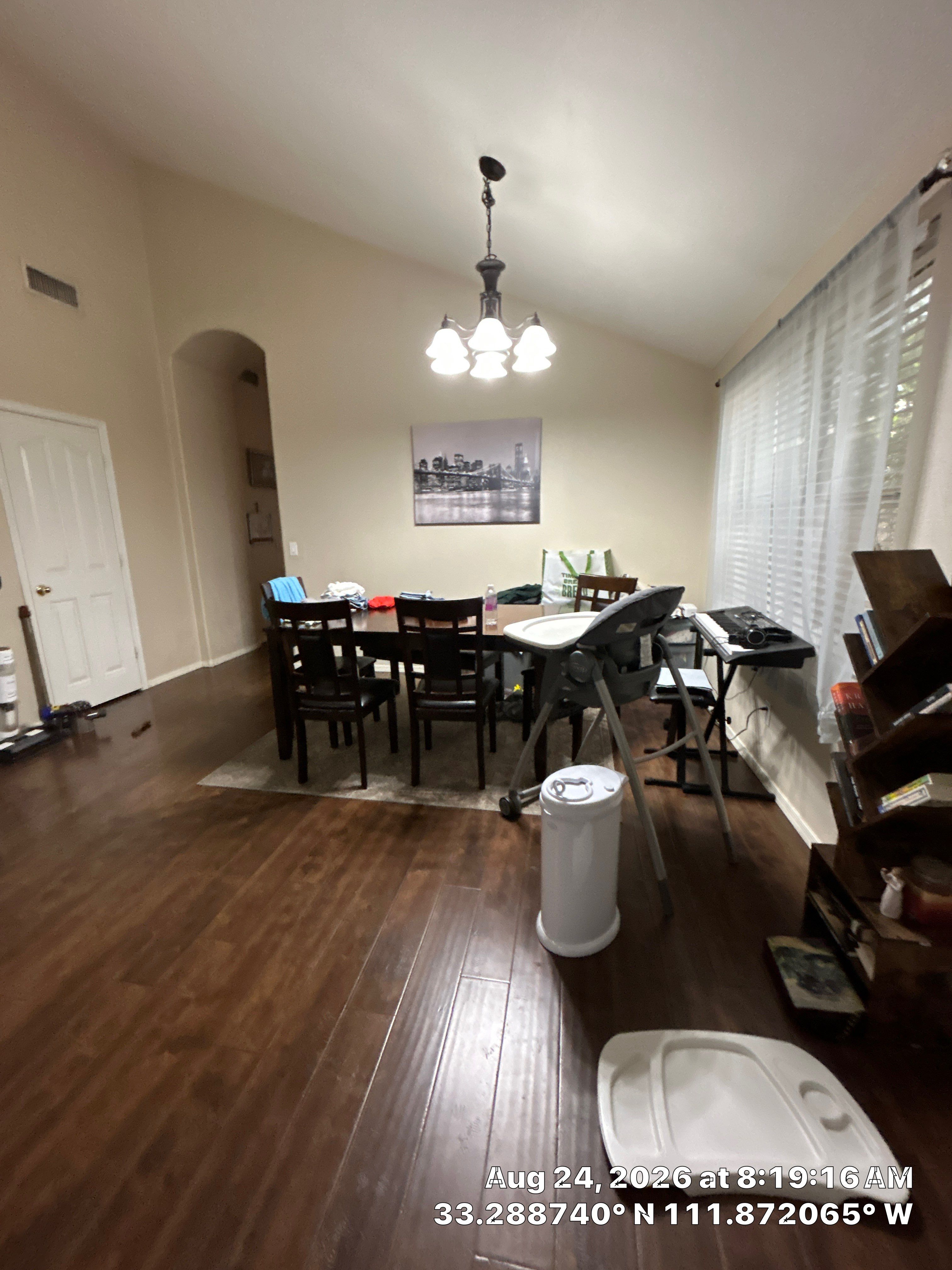 Dining Room Remodel Featuring Dark Wood Laminate Flooring in Chandler by CompanyCam Sales Demo