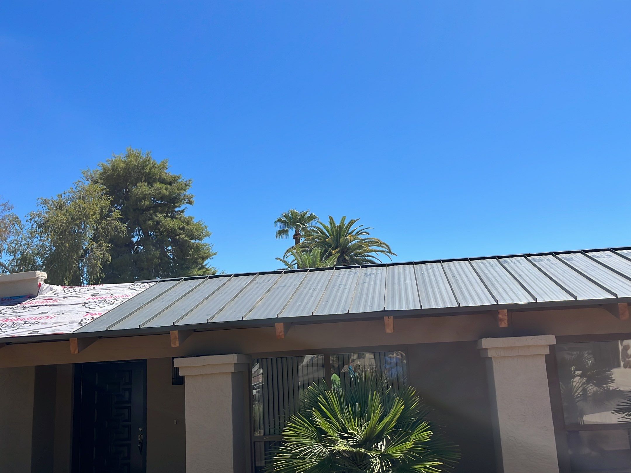 Charcoal Gray Standing Seam by Reimagine Roofing