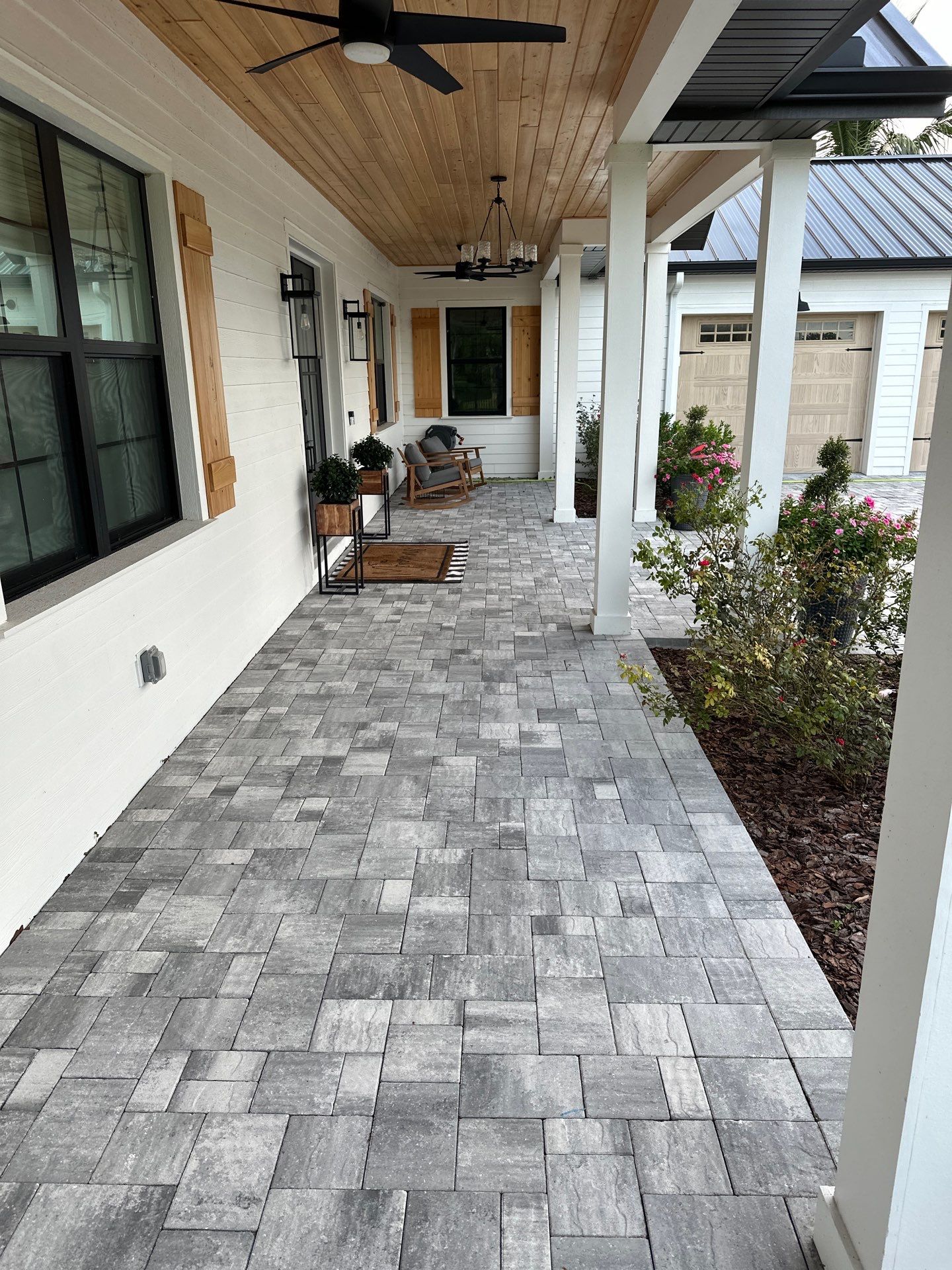 Complete Two-Story House Wash and Driveway Cleaning in Winding River Community, Bradenton, FL by Sunshine AquaWash