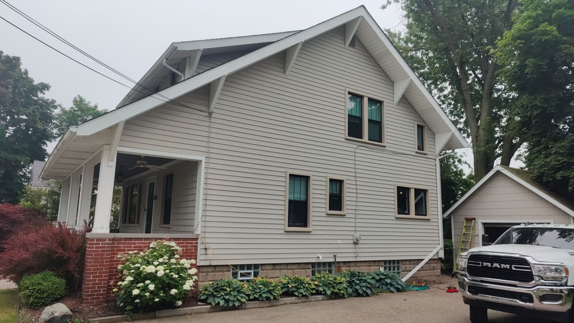 Siding Replacement using Alside Charter Oak D4.5" Deep Moss by 180 Contractors