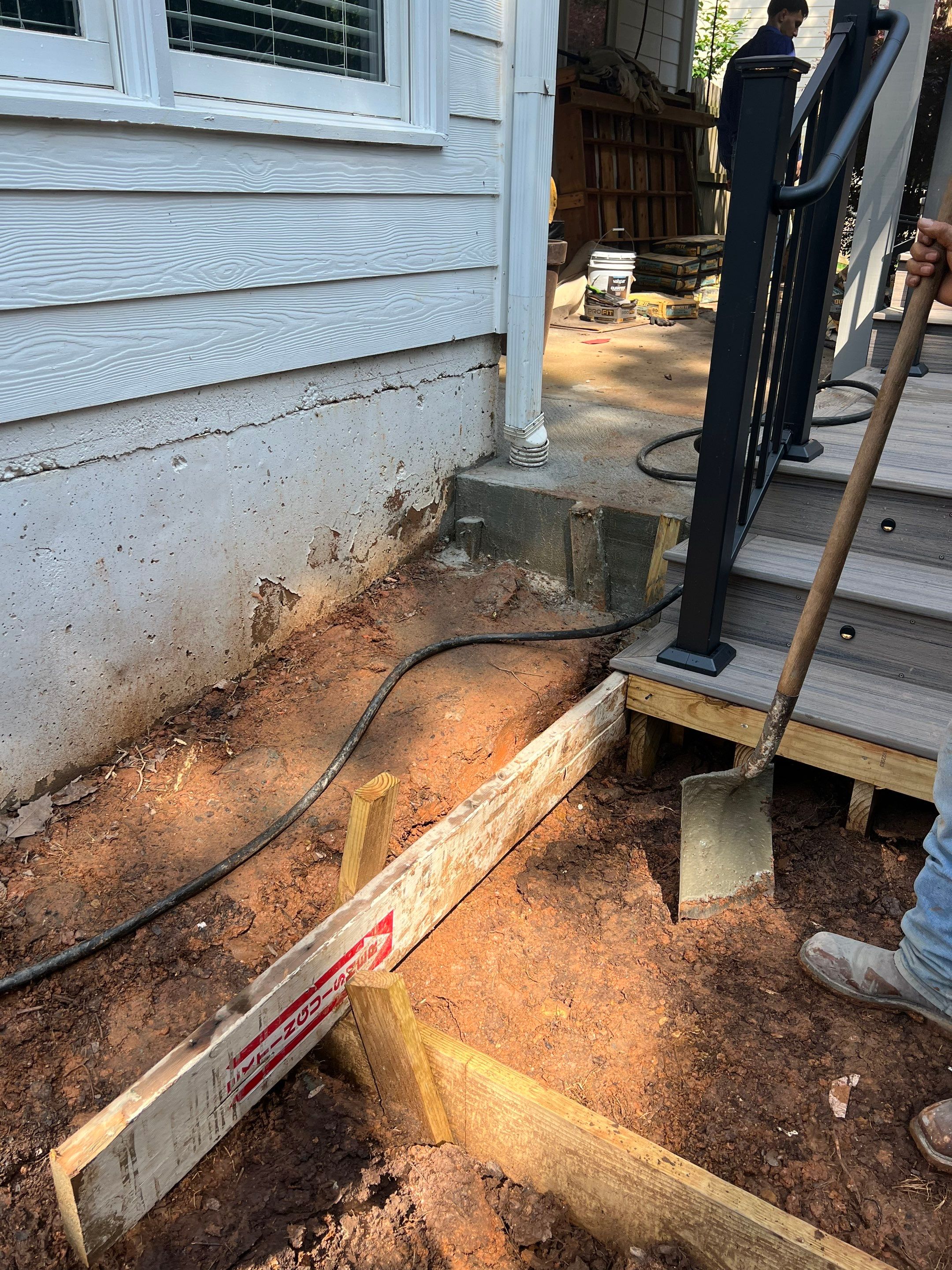 Elevated Composite Deck and Concrete Landing Installation in Kennesaw by Swift Home Renovations