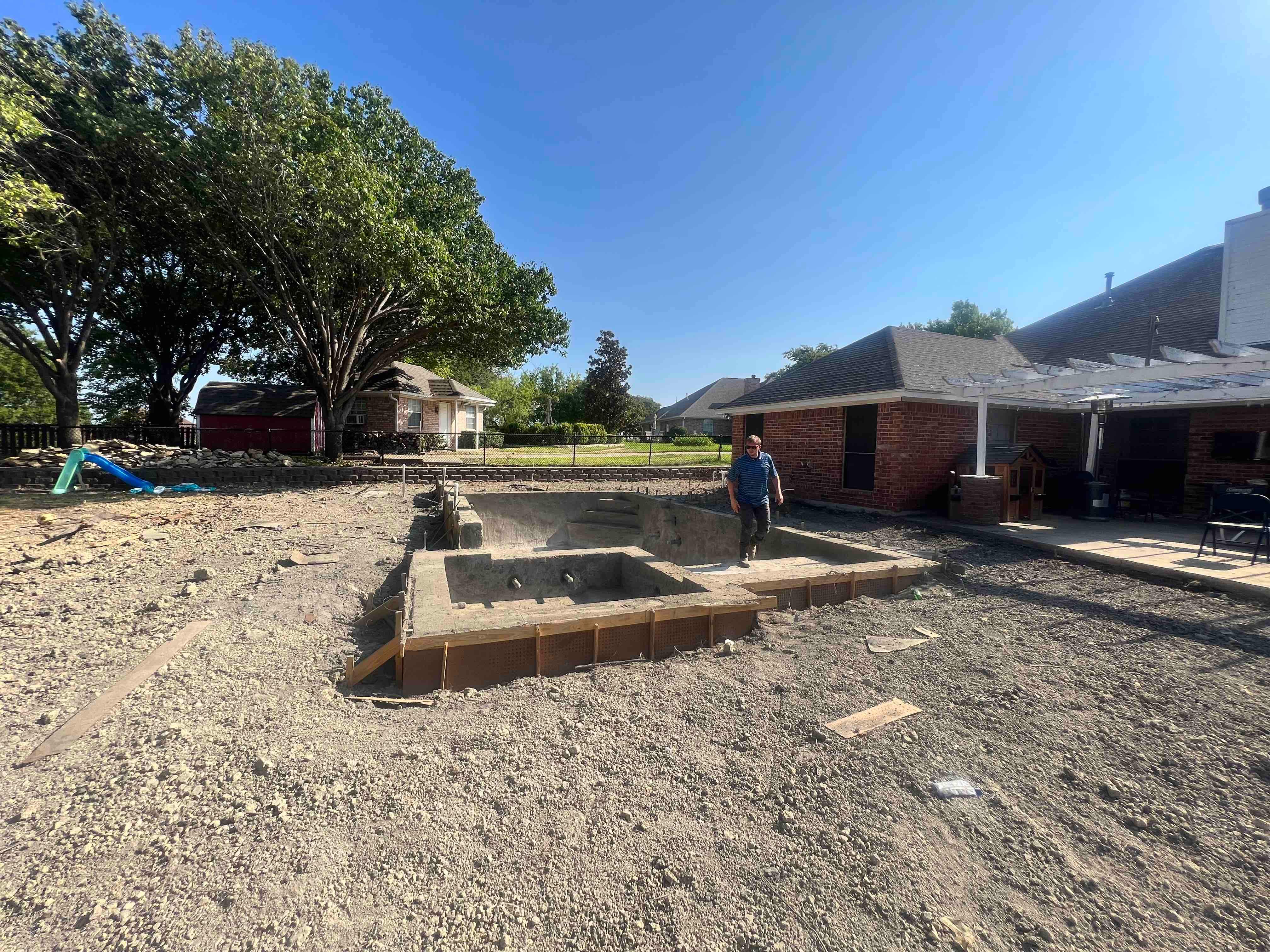 Geometric Pool with Raised Spa and Slide by Pinnacle Pools and Spas - DFW