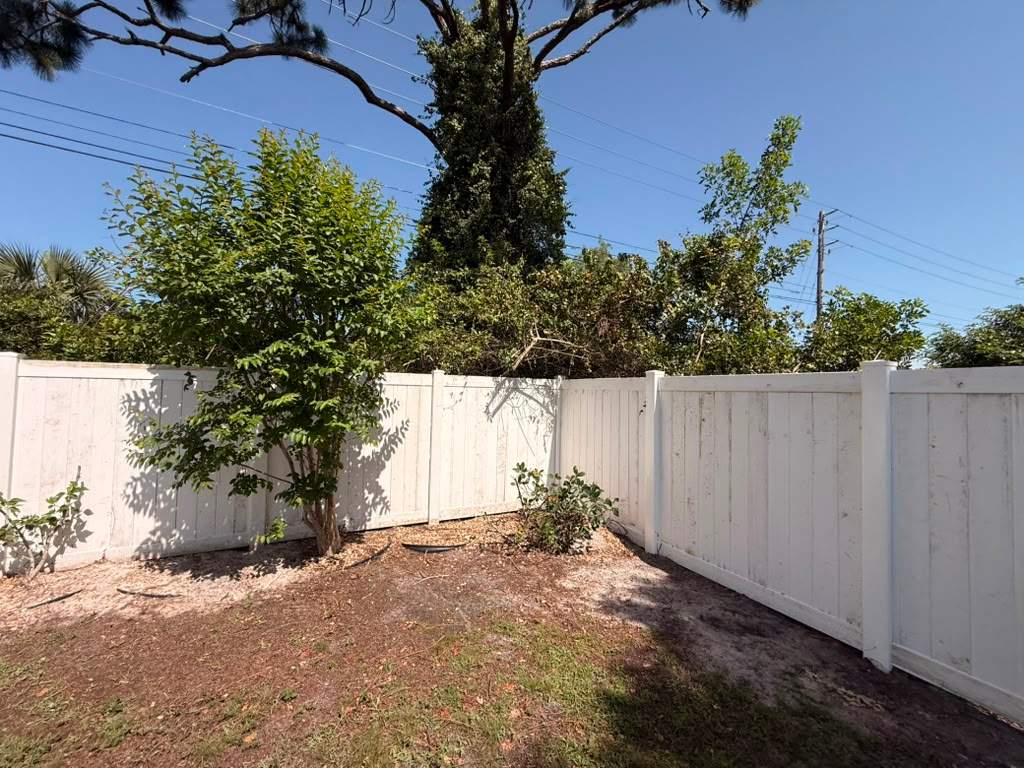 White Vinyl Privacy Fence Repair and Replacement in North Port by True Fence LLC