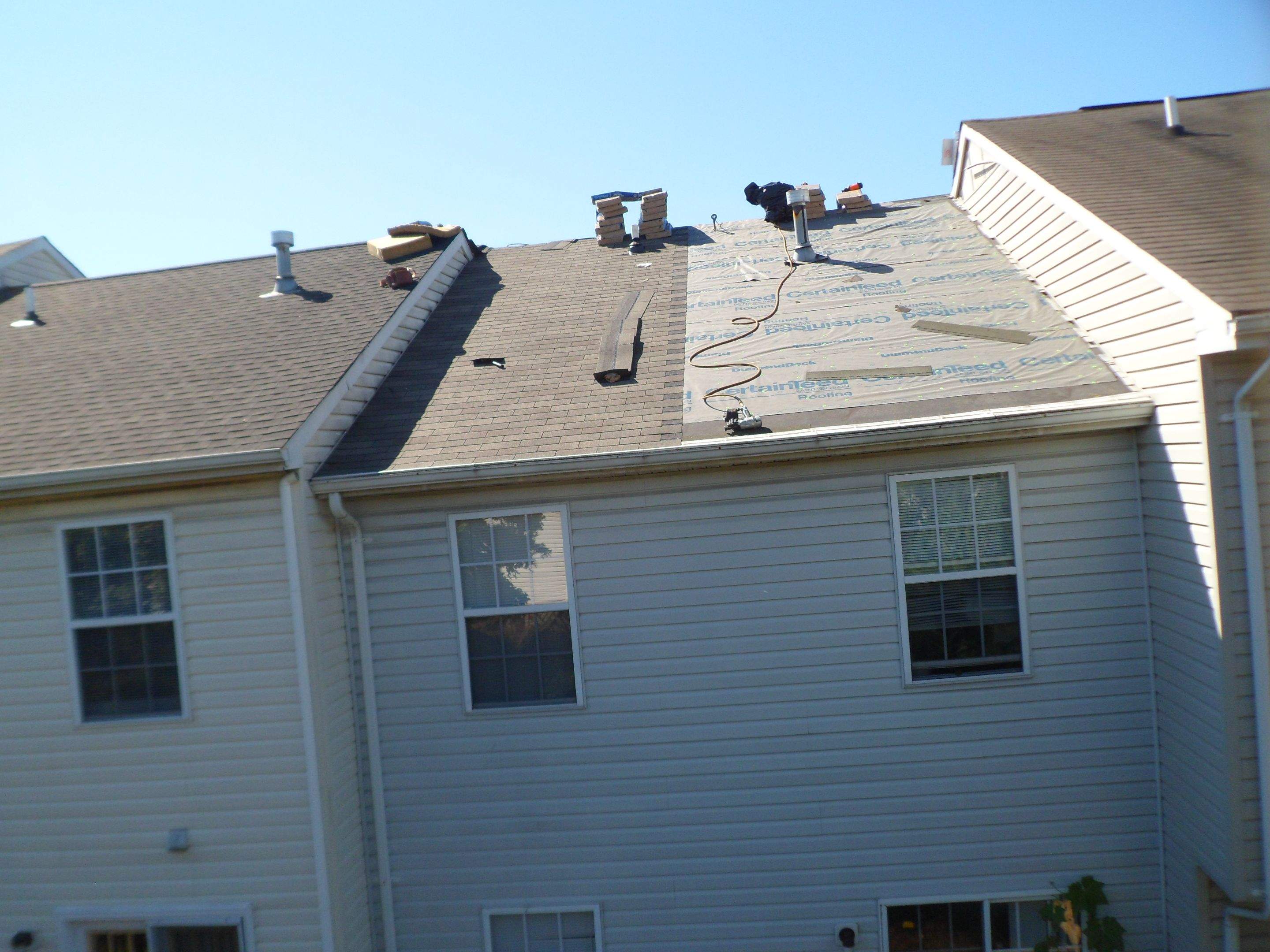 Residential Roofing Installation by Alpha Design Services