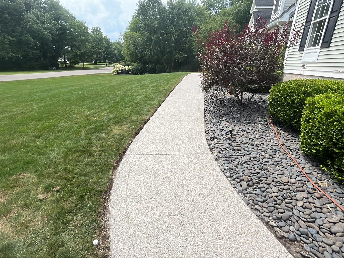 Scarelli Garage & Walkway TransFLOORmation by Symphony Concrete Coatings