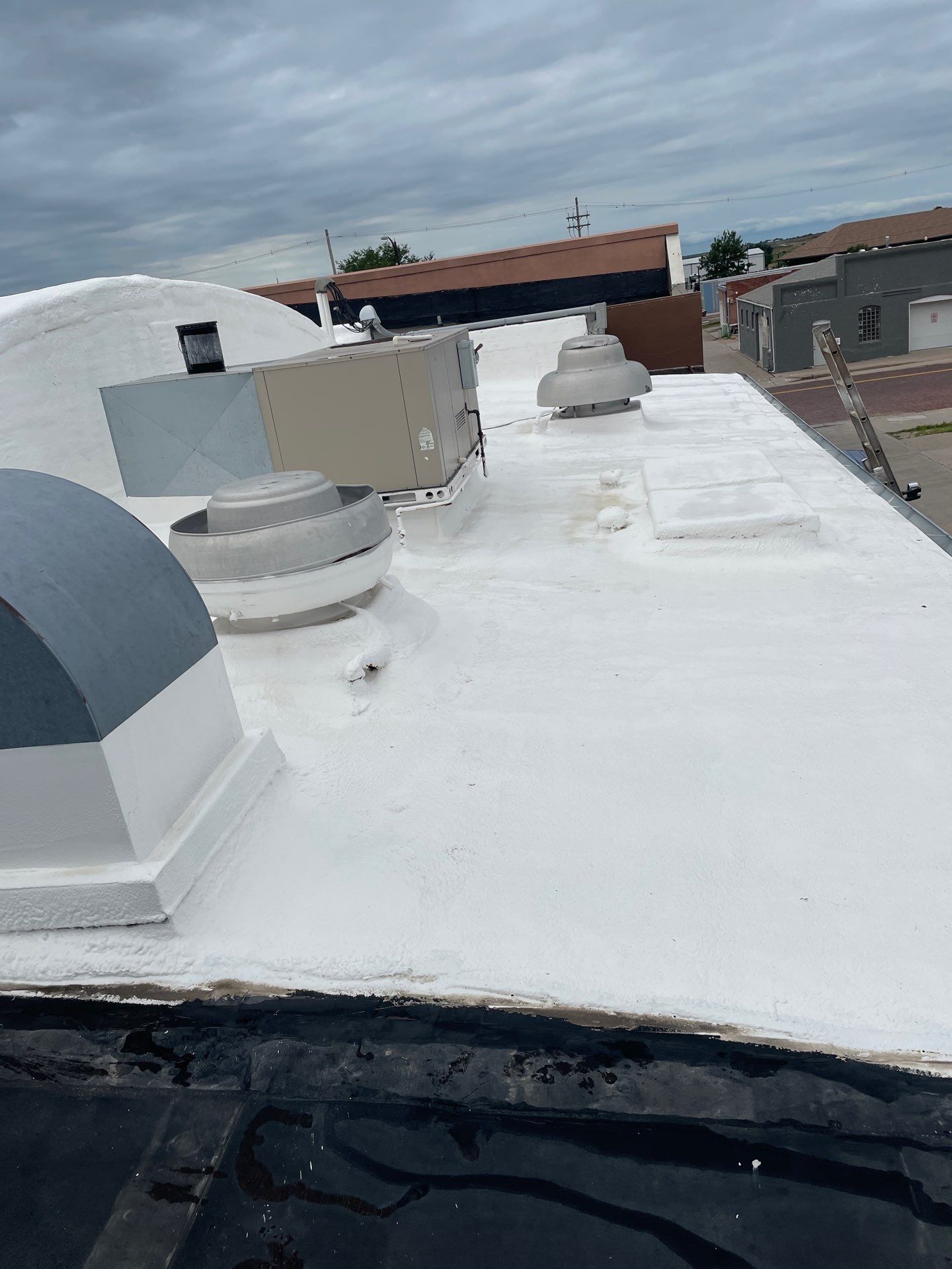 Roof Coating - South Central Area Recovery - Holdrege, Nebraska by Tillotson Enterprises