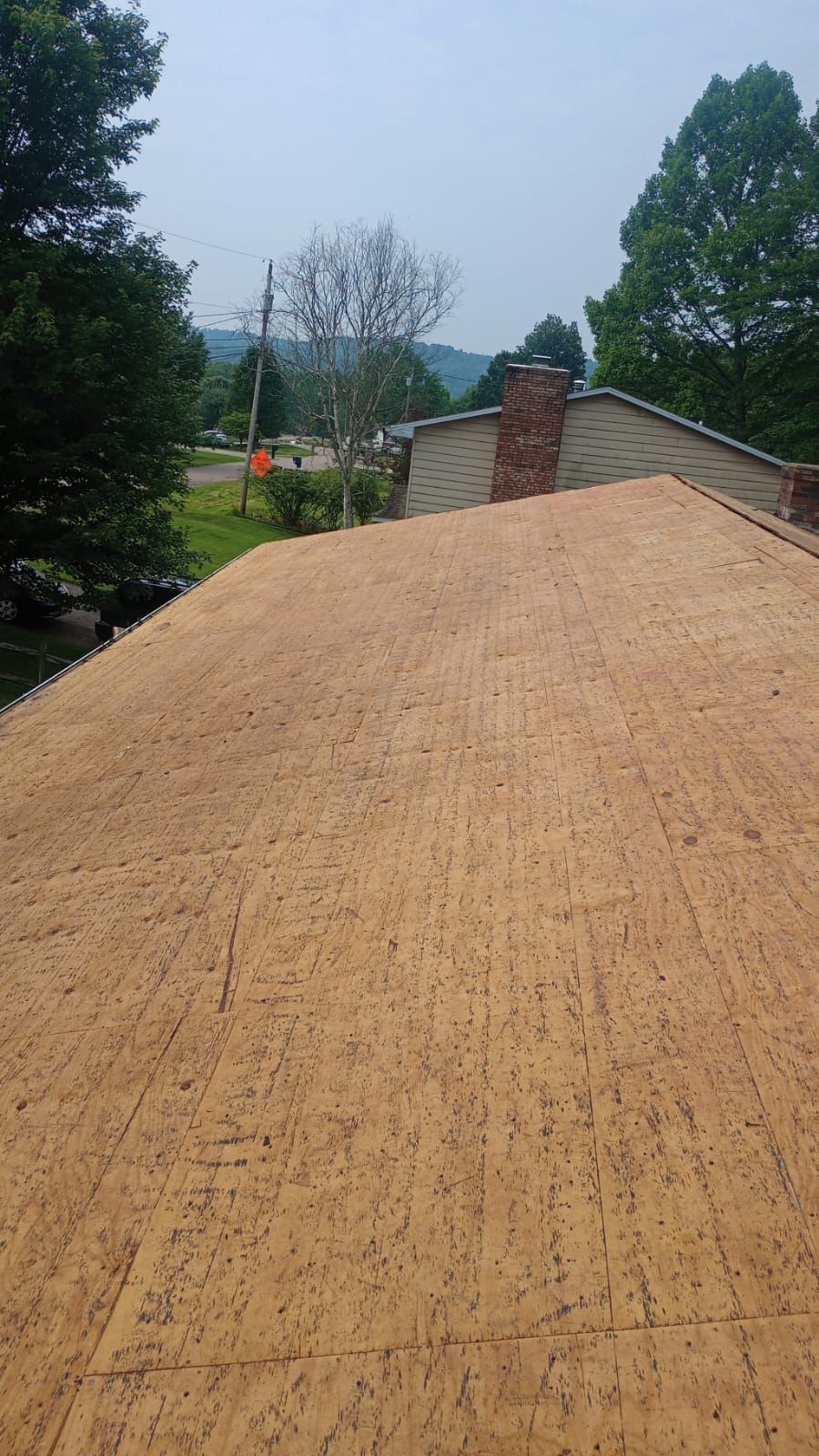 Residential Roofing Installation using GAF Timberline HDZ Charcoal by Rainstoppers Roofing