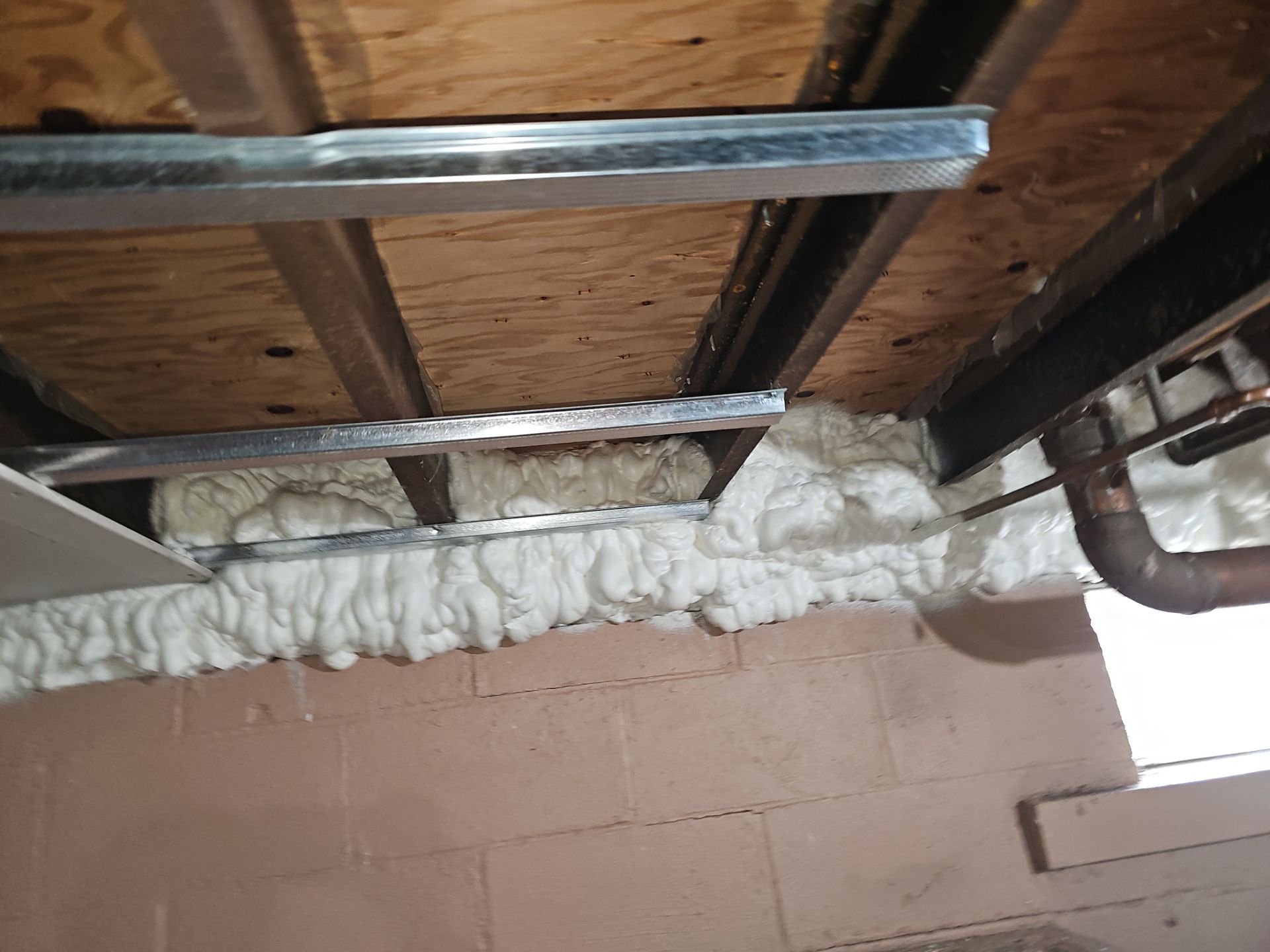 Attic Insulation using open cell spray foam by NYS Foam & Energy