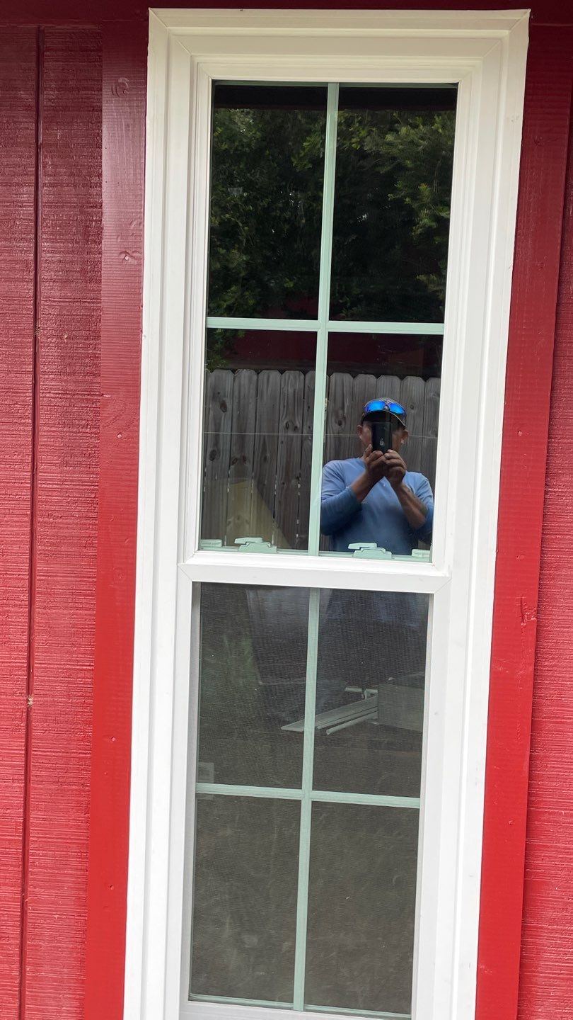Black and white and red all over by Bayfront Roofing and Construction