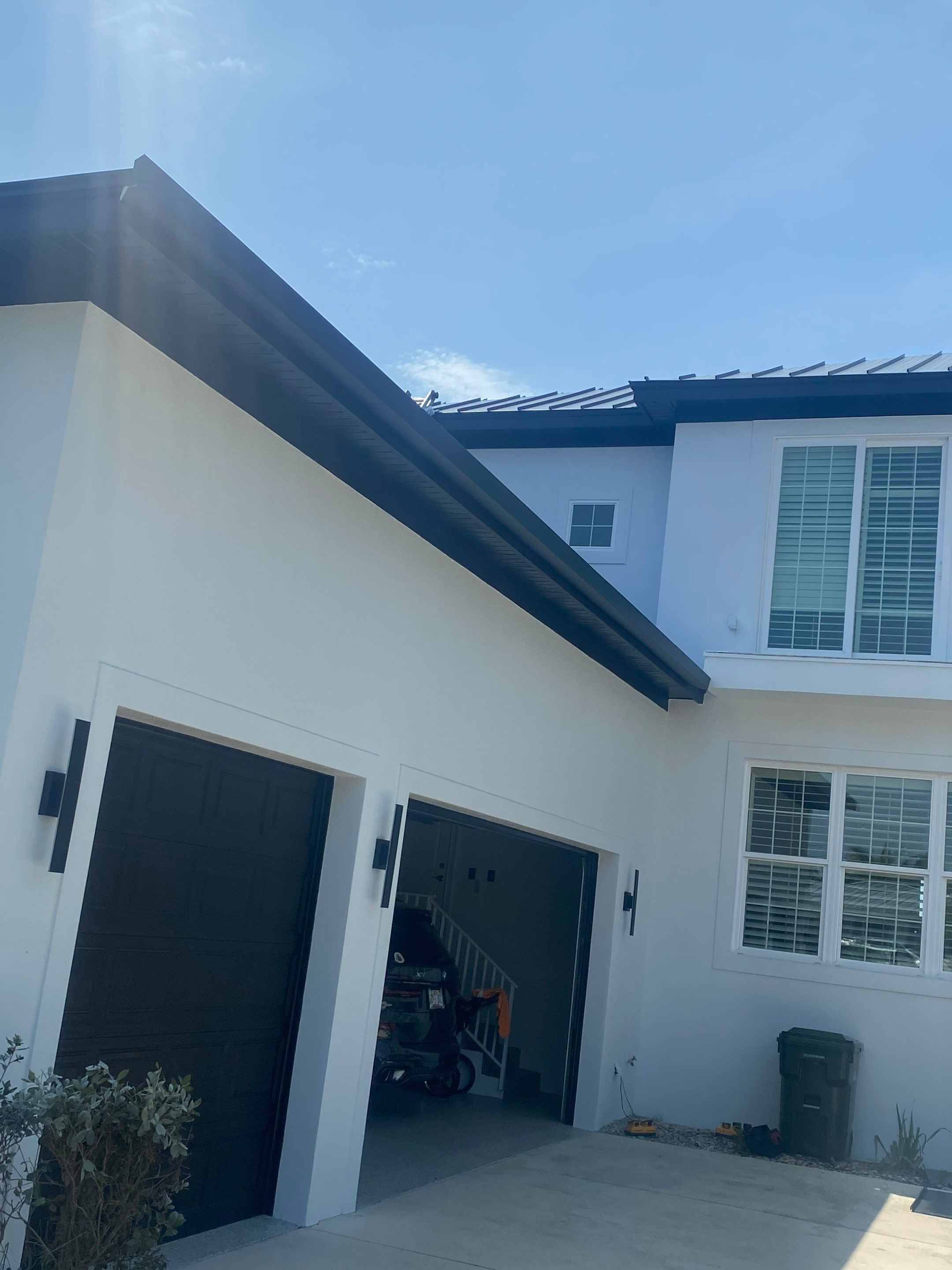Soffit and Fascia Installation and black seamless gutters in Sarasota FL by Gutter Professors