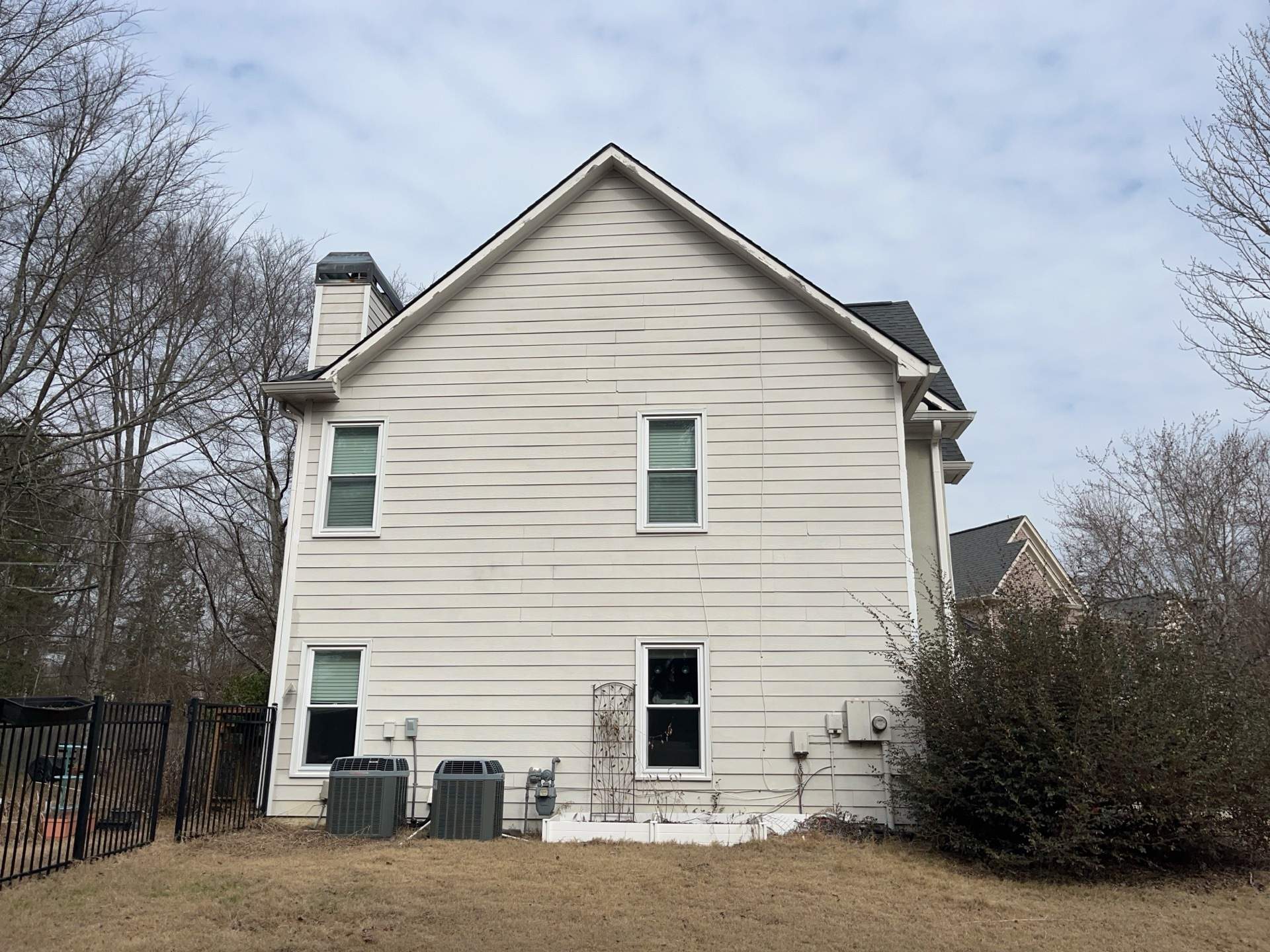 Marietta, GA Chimney Siding, Fascia, and Soffit Replacement using James Hardie Lap Siding, Hardie Trim, and Hardie Panel by Nelson Exteriors 