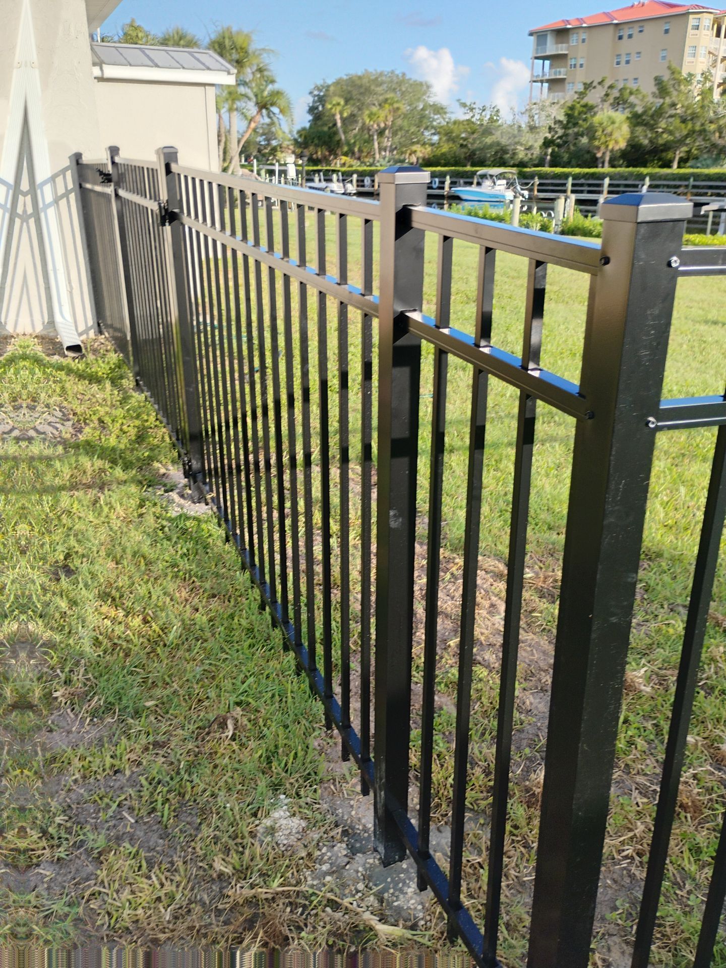 Black Aluminum Waterfront Fence Installation in Osprey by True Fence LLC