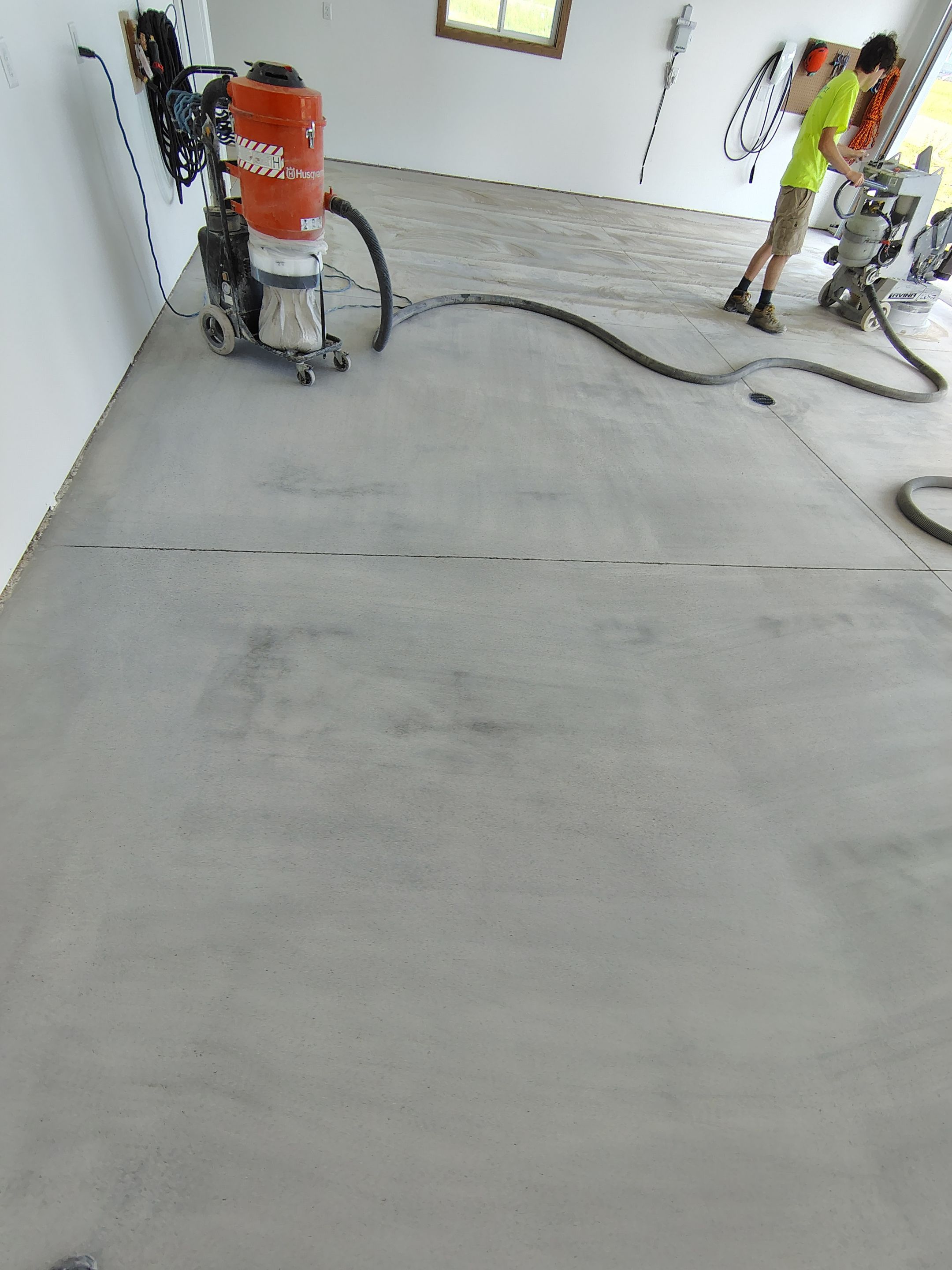 Gray and White Speckled Epoxy Garage Floor Coating in Tea by Select Painting, Coatings & Garage Cabinets