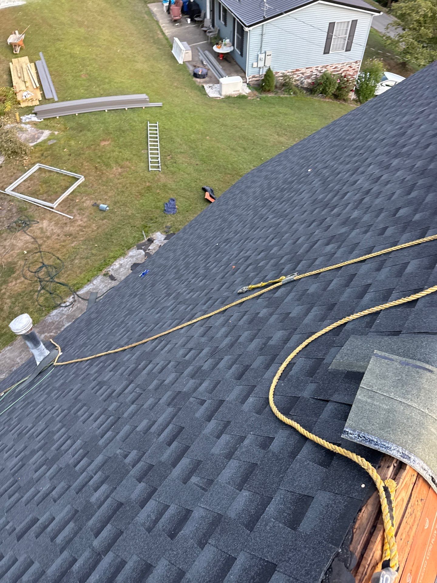 Residential Roofing Installation using GAF Timberline HDZ Charcoal by Rainstoppers Roofing