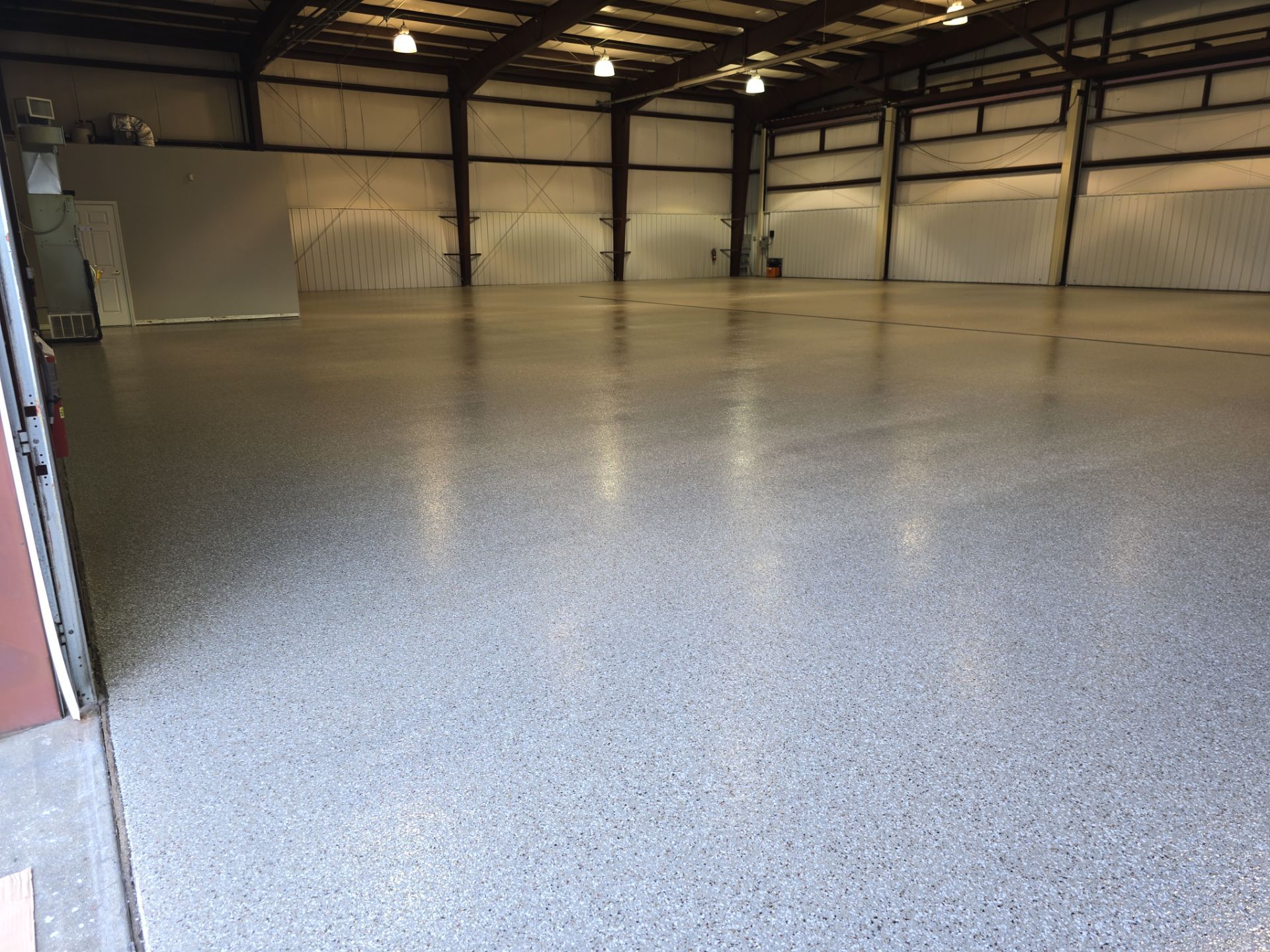Airplane Hanger Coating & Storage! by Innovative Spaces / Innovative Concrete Coatings