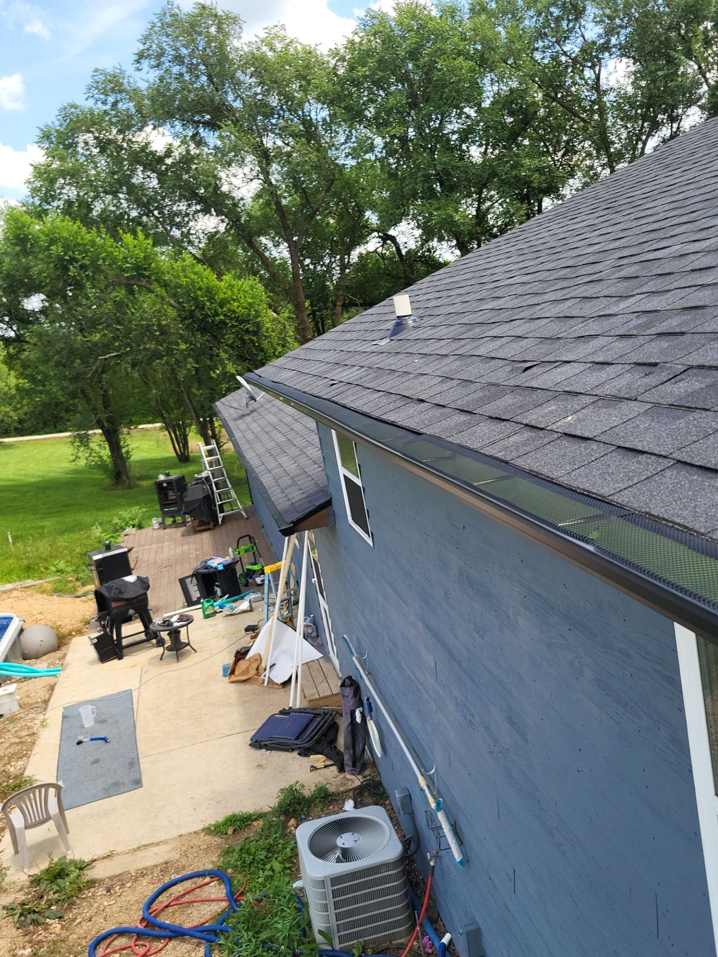 Residential Roof + Gutters & Downspouts Install  by Titan Commercial & Residential Roofing 