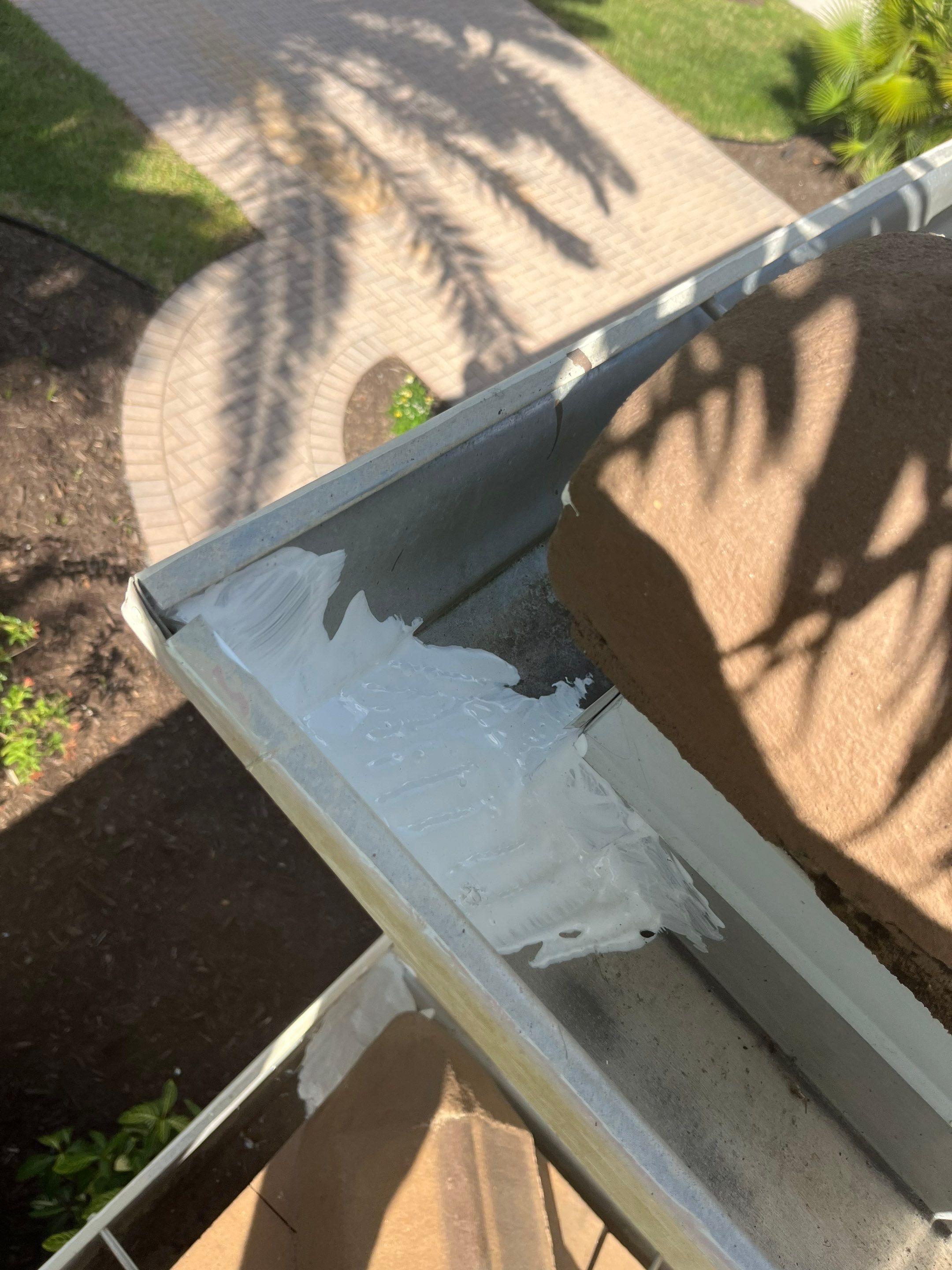 Gutter Cleaning and Maintenance in Sarasota FL by Gutter Professor by Gutter Professors