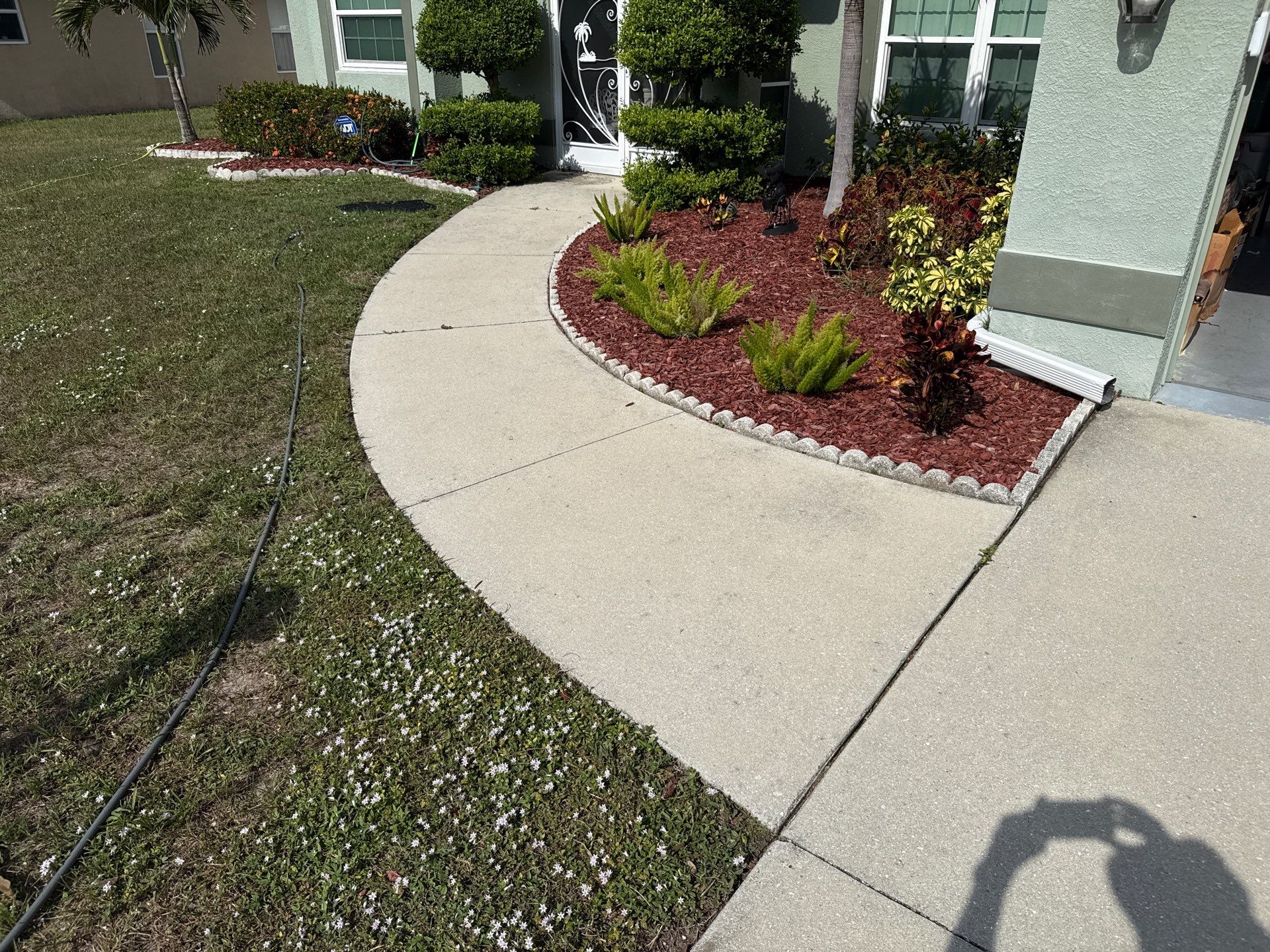 Concrete Driveway Cleaning in Arbor Creek Community – Palmetto, FL by Sunshine AquaWash