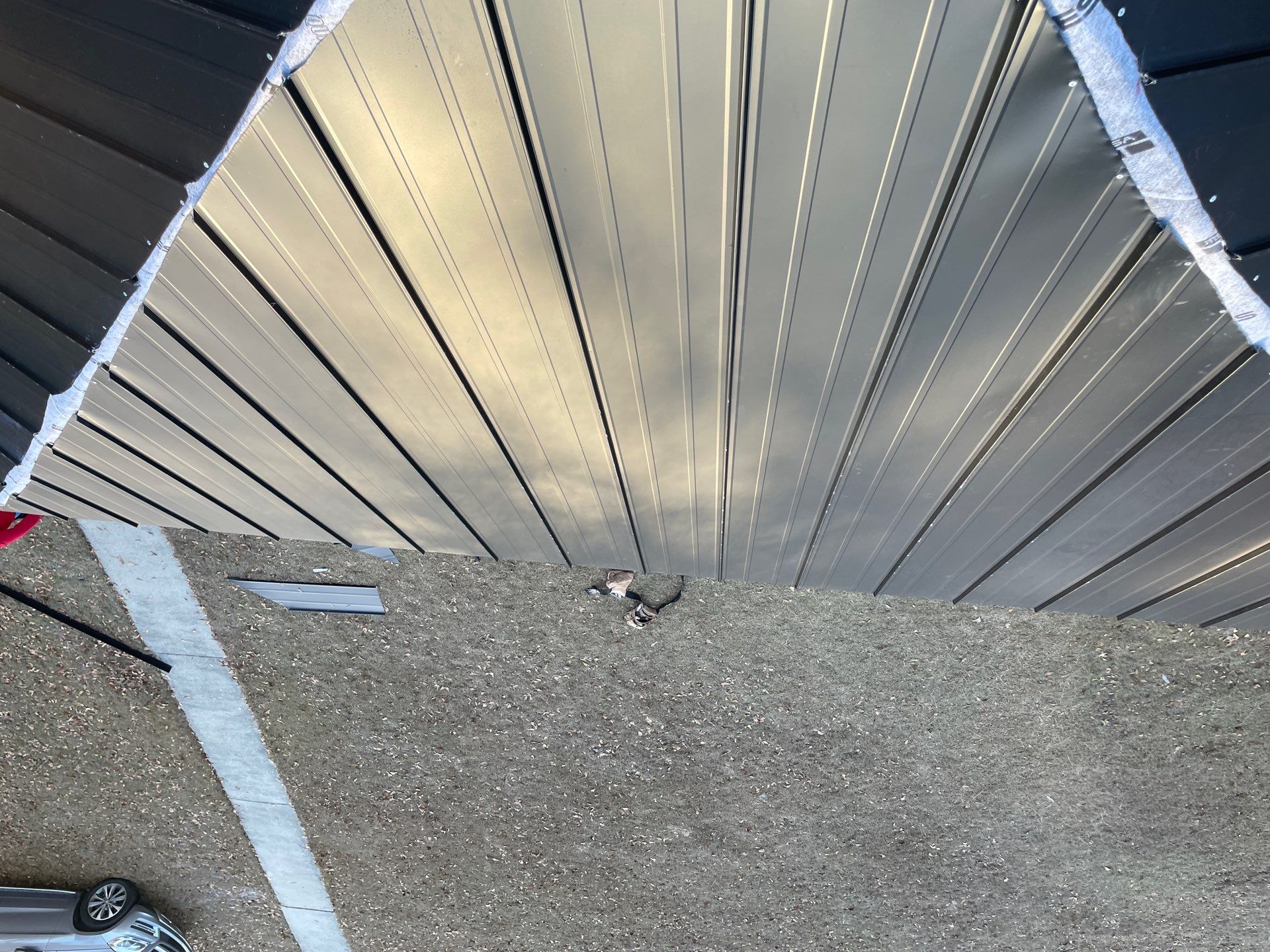 Residential Roofing Installation using Benton 26Ga 1inc Snapcock Metal Roof KYNAR Matte Black by Talya Roofing