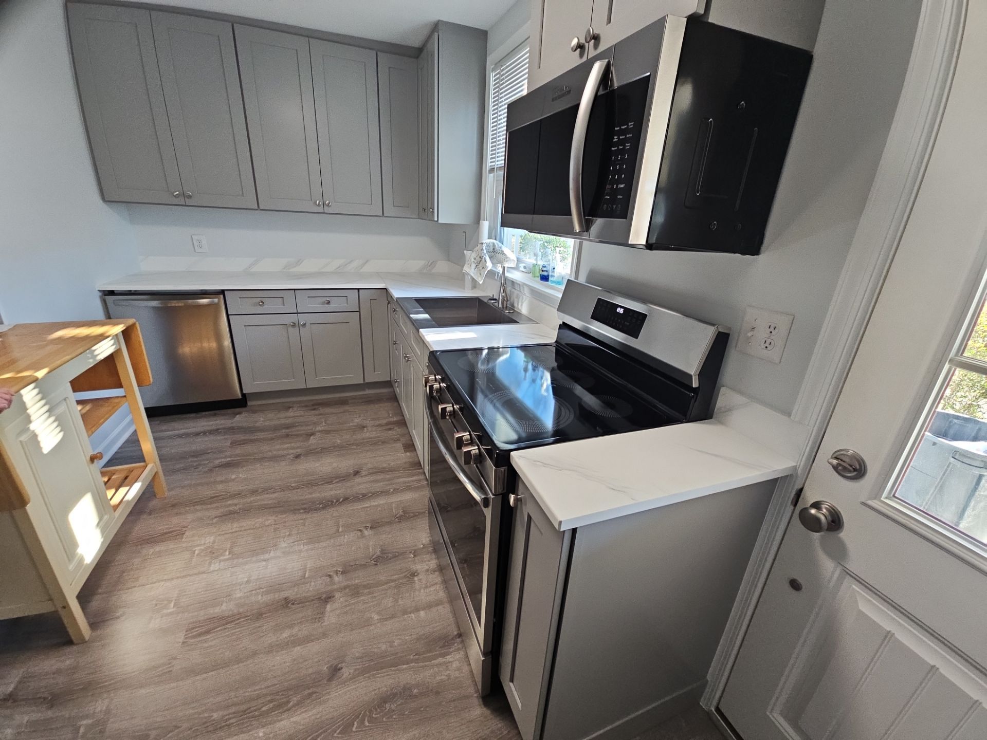 Kitchen and living area remodel by Window Depot of Annapolis