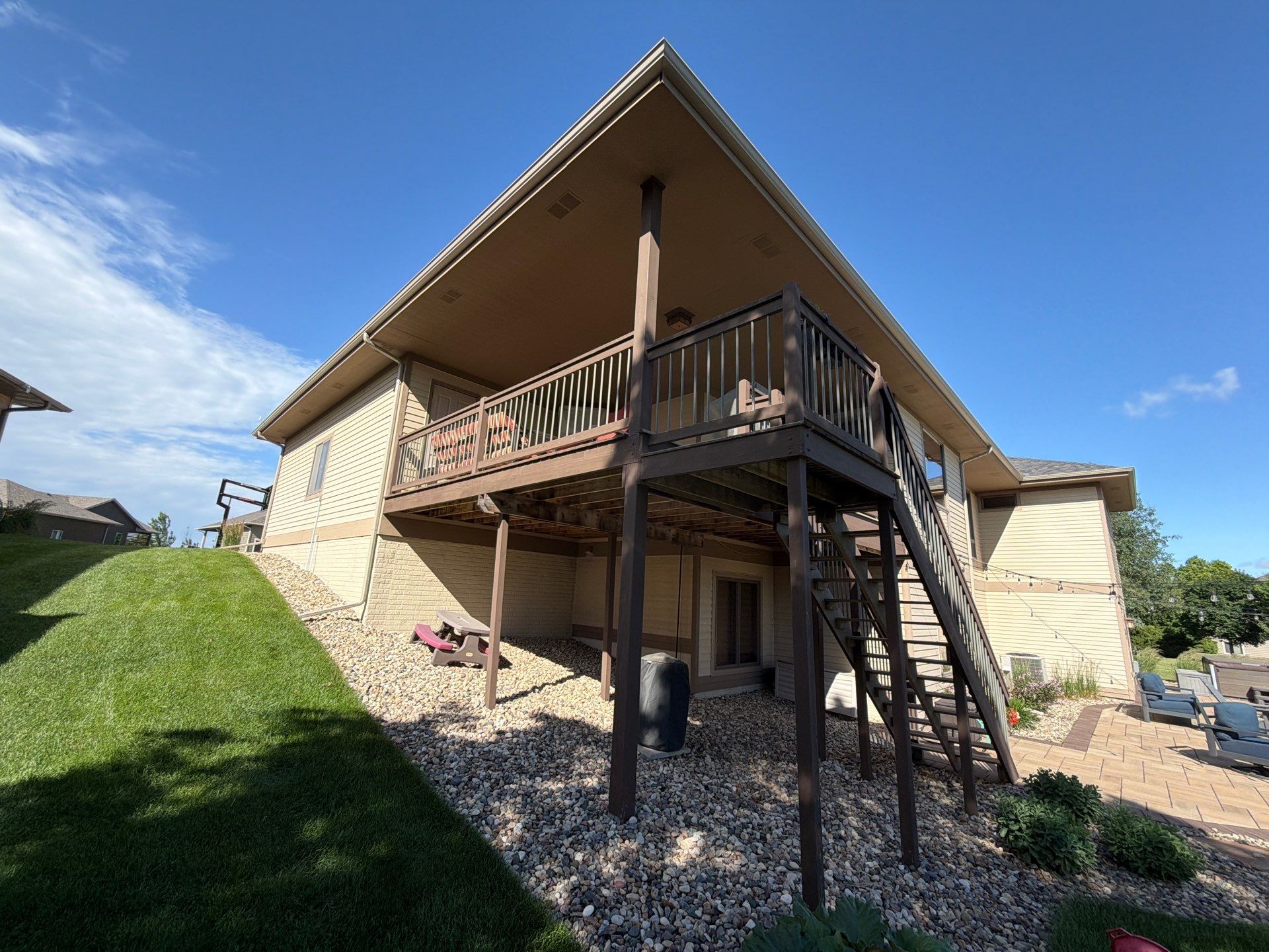 Sioux Falls Exterior Refresh and Multi-Level Deck Maintenance by Select Painting, Coatings & Garage Cabinets