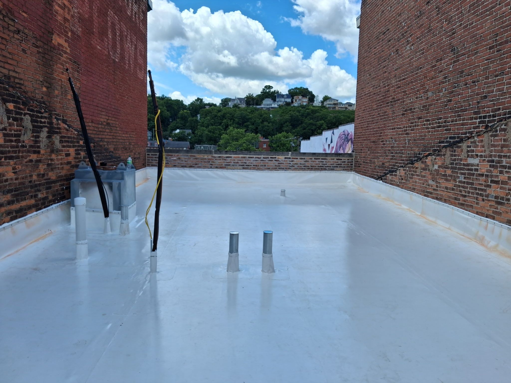Commercial PVC Roof Installation- Downtown Dubuque, IA by Grell Roofing, LLC