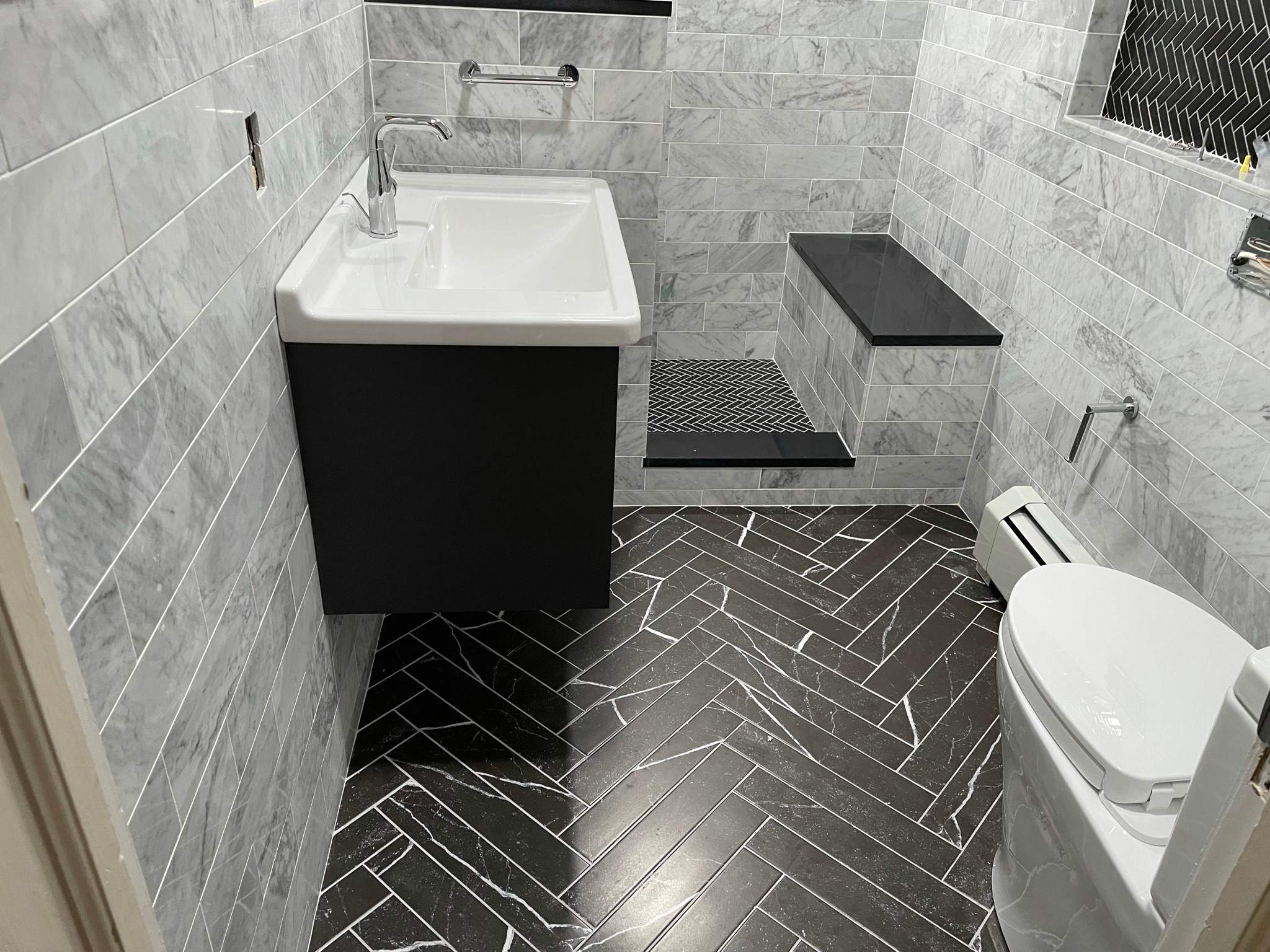 Bathroom Remodel using Tile by Home Concepts Construction