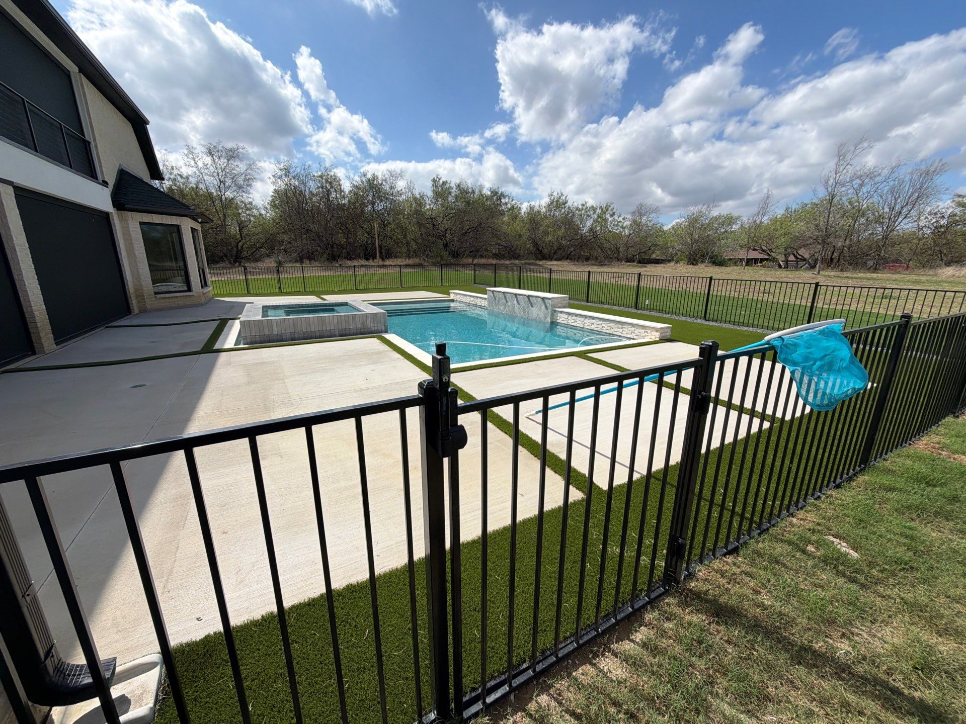 Modern Geometric Pool with Raised Spa and Tanning Ledge by Pinnacle Pools and Spas - DFW
