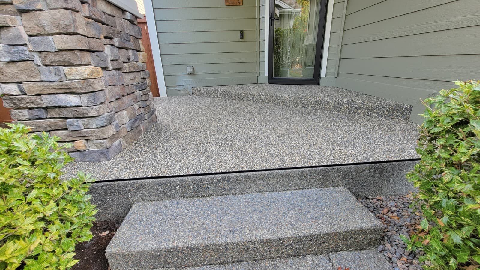 Elegant Front Patio in Big Sur Vuba Stone by Concrete Coating Experts Inc.