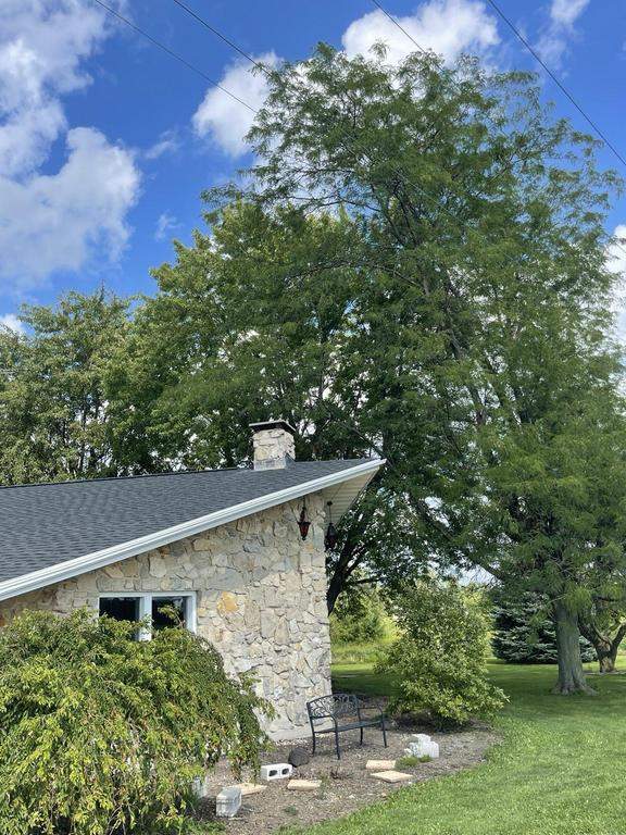 Storm damage roof replacement by Nitro Roofing and Construction