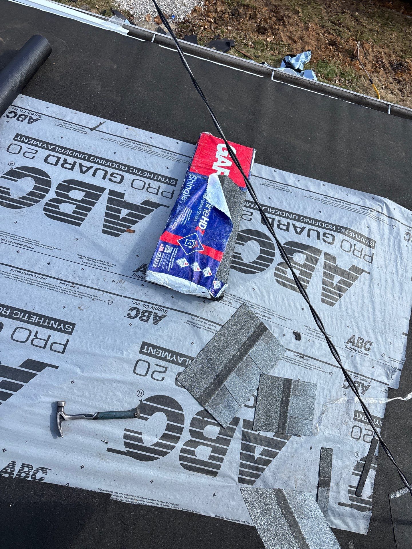 Residential Roofing Installation using GAF Timberline HDZ Charcoal by Rainstoppers Roofing