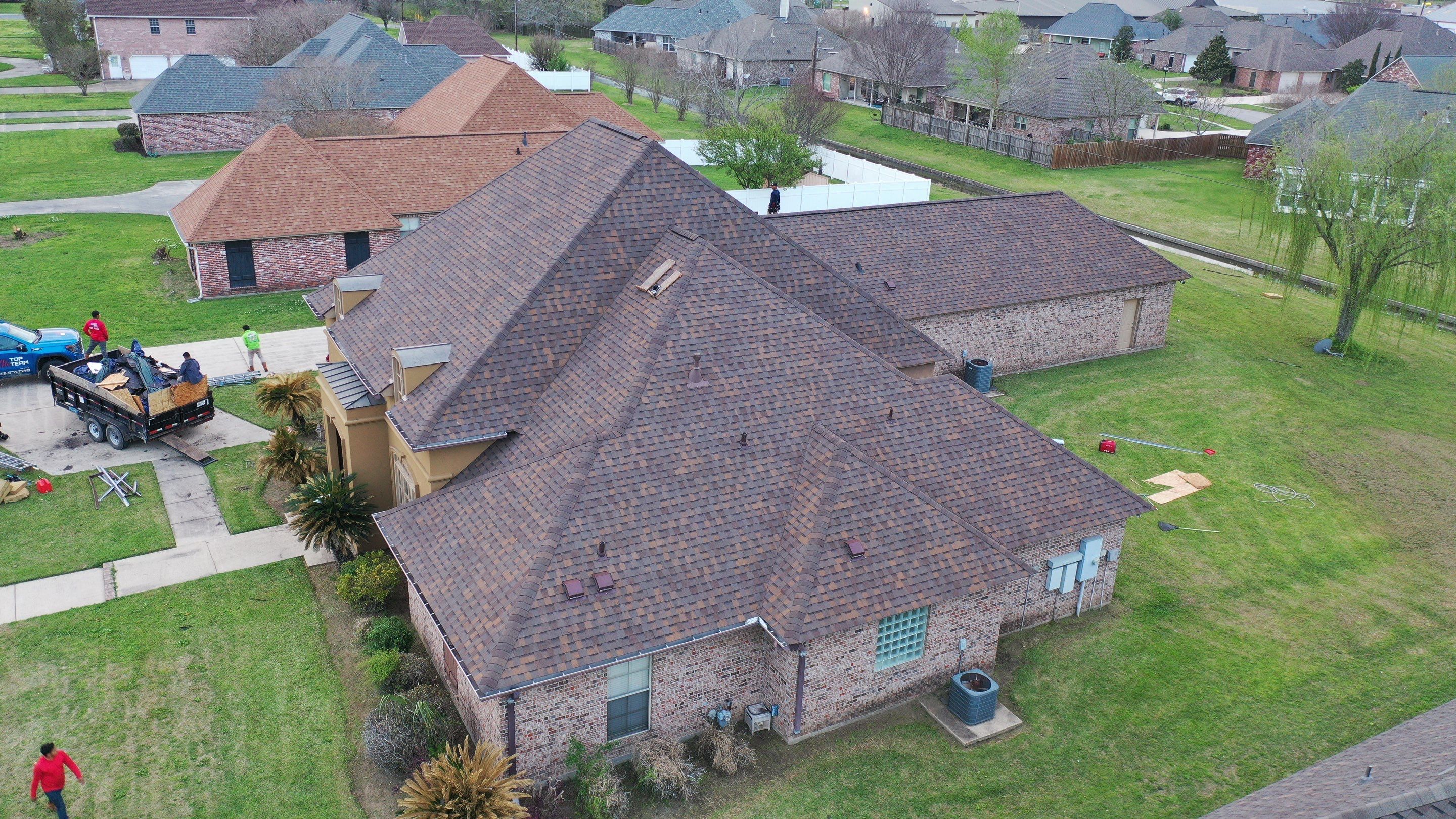 Residential Roofing Installation using Atlas Pinnacle Pristine Copper Canyon by Top Team Construction