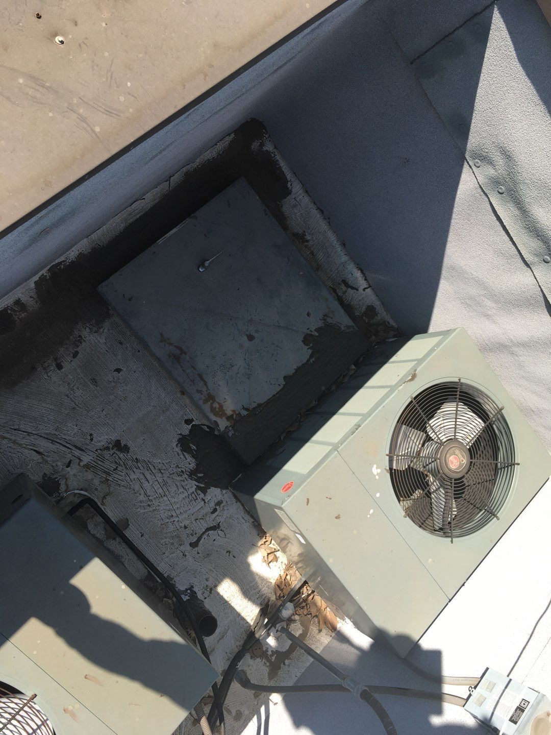 Spray foam and coatings inside commercial building HVAC well using Spray foam and coatings over existing BUR system by Straight Edge Roofing Inc