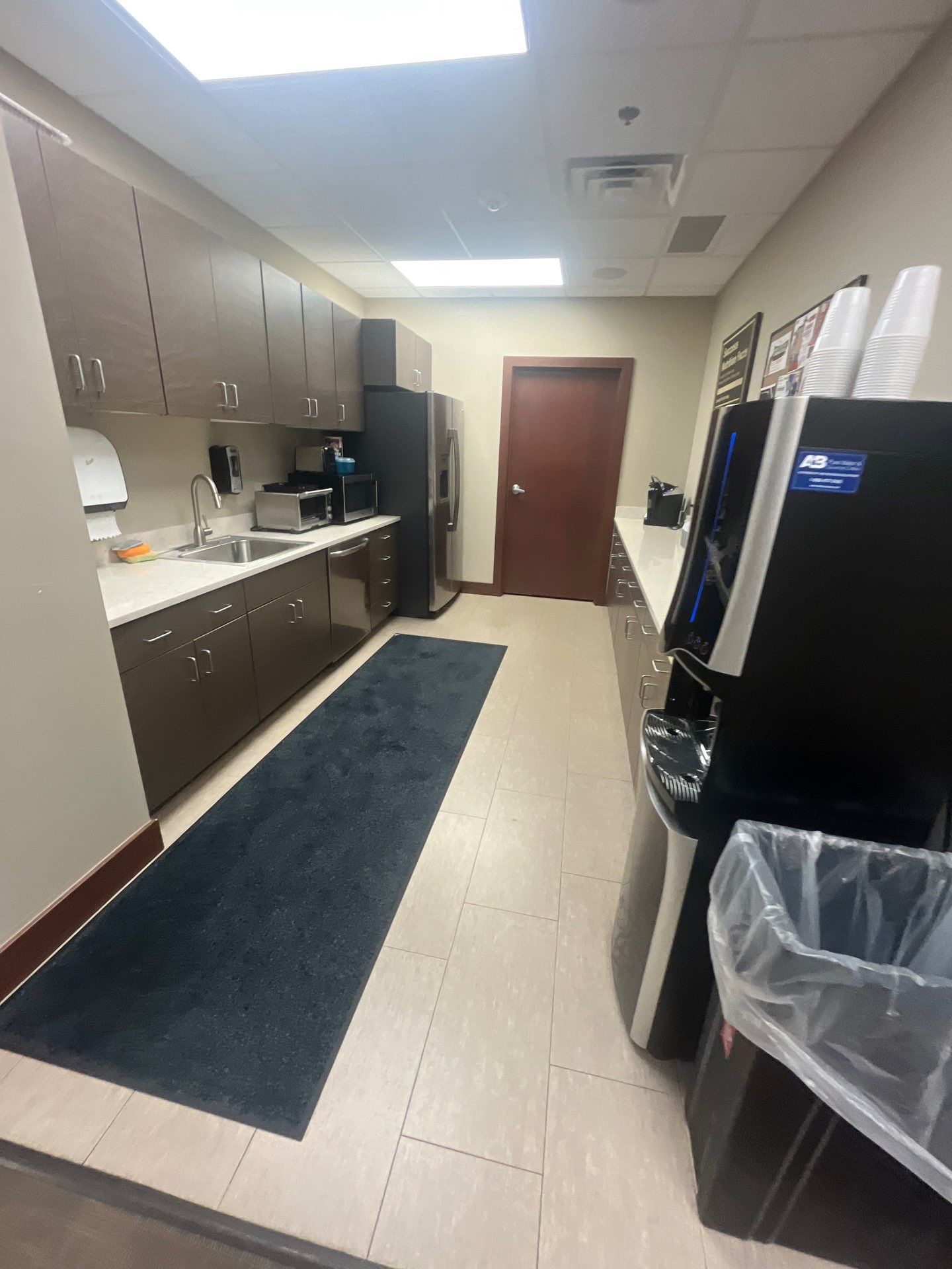 Commercial Office Interior Remodel and Modern Suite Refresh in Sioux Falls by Select Painting, Coatings & Garage Cabinets